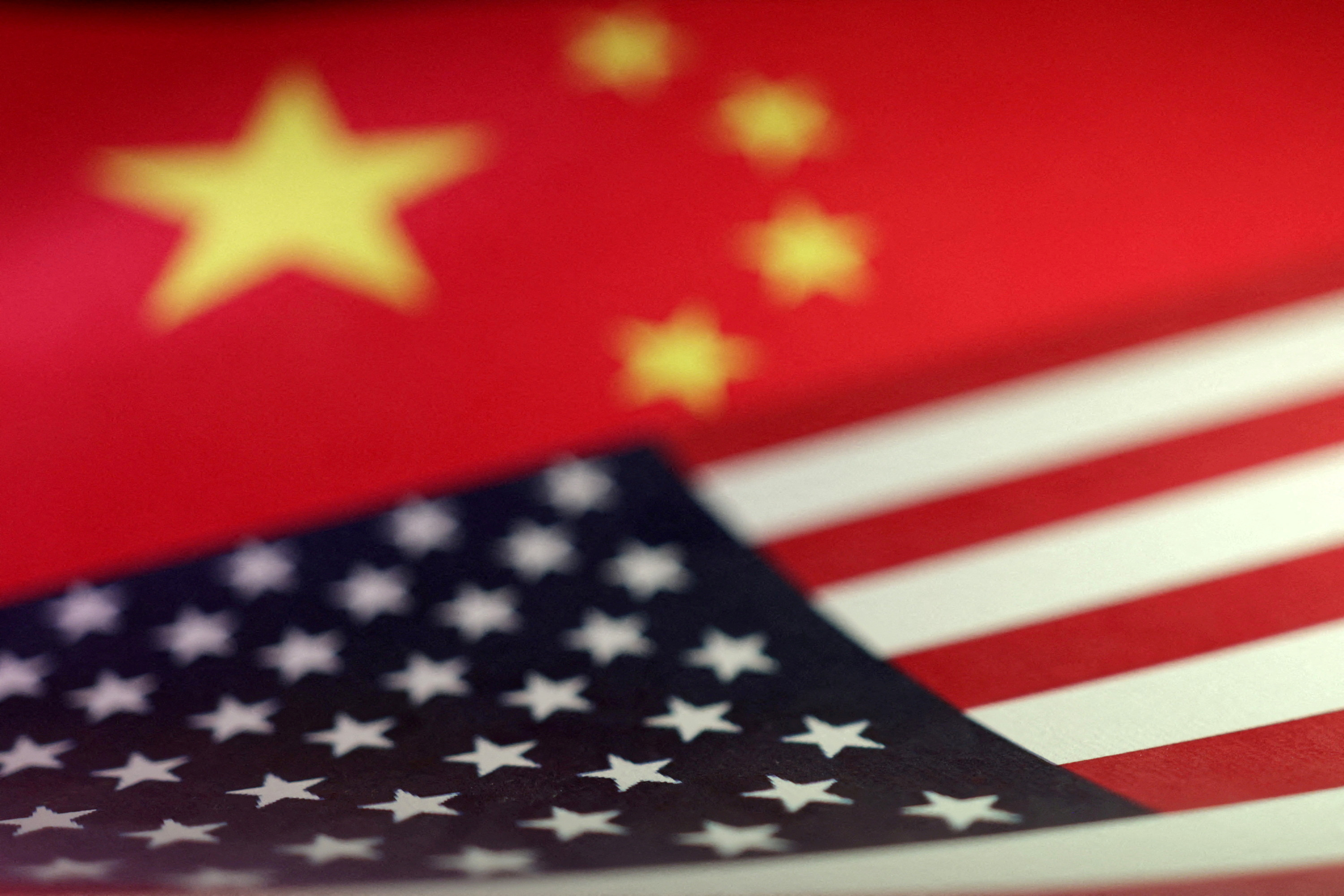 China targets US firms and drone exports after FCC, Xinjiang actions | Reuters