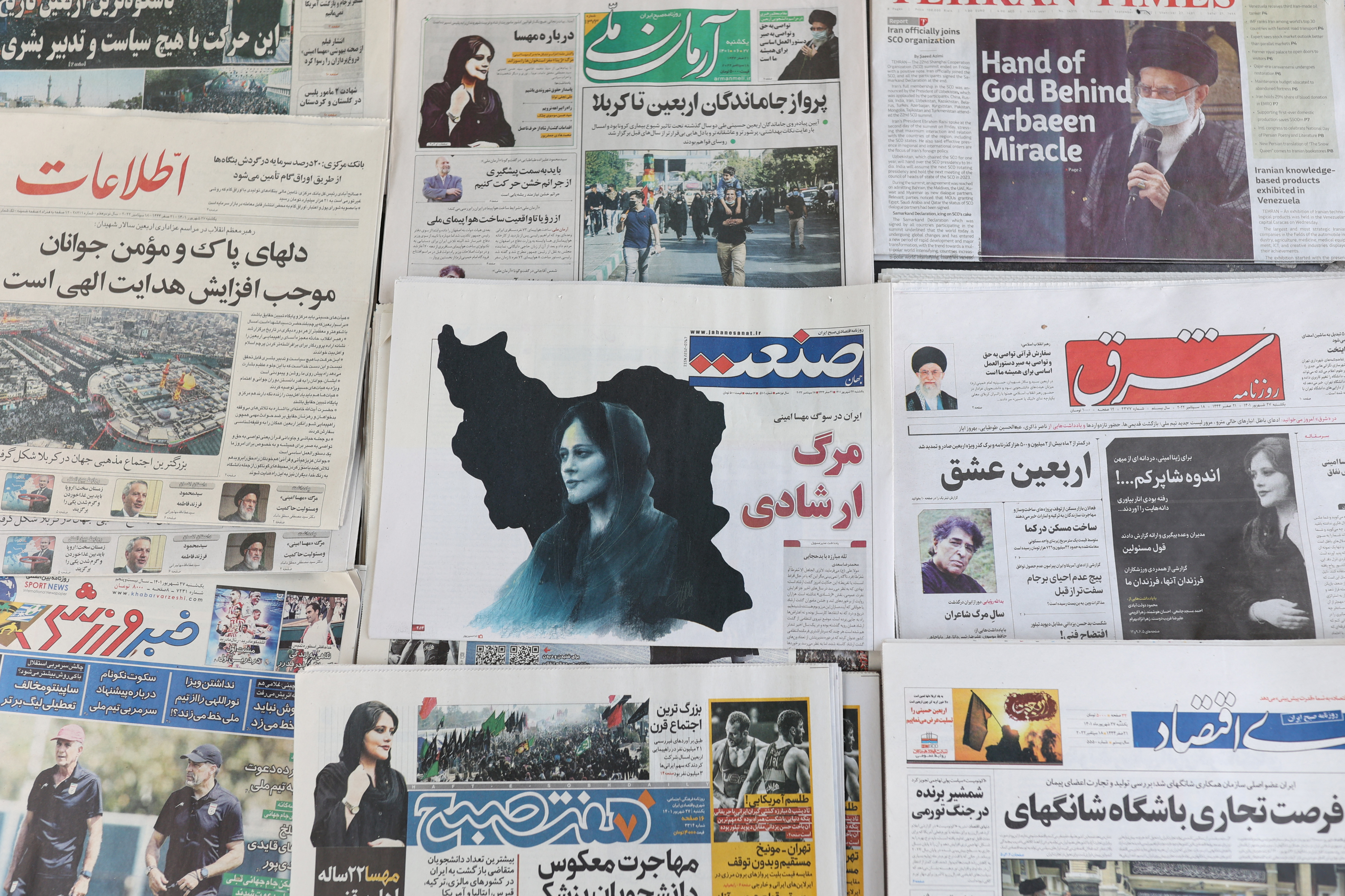 Newspapers with a cover picture of Mahsa Amini, a woman who died after being arrested by the Islamic republic's 