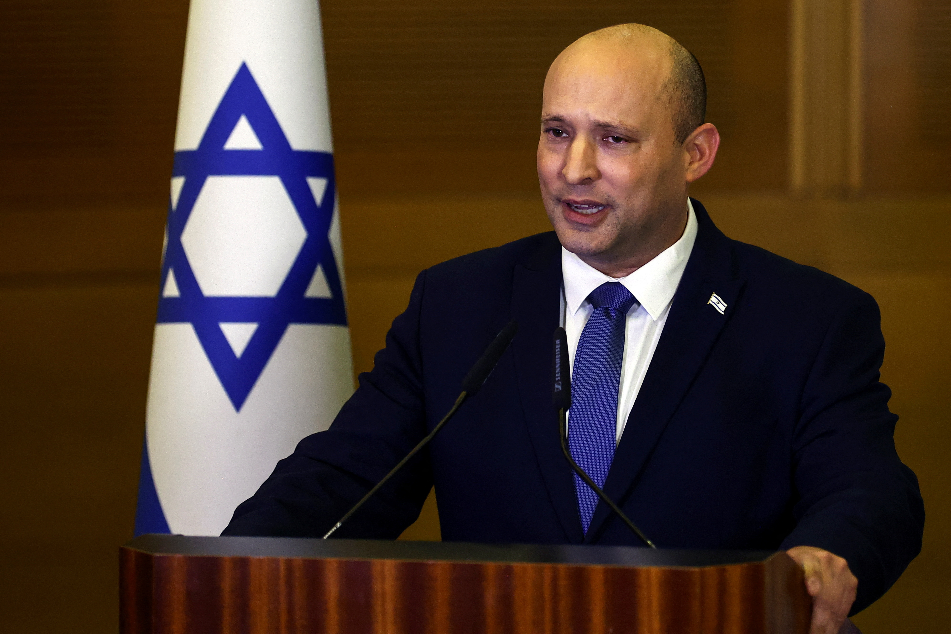 Israeli Prime Minister Naftali Bennett delivers a statement to the media, telling reporters he will not be running in Israel’s next election, at the Knesset, the Israeli Parliament, in Jerusalem