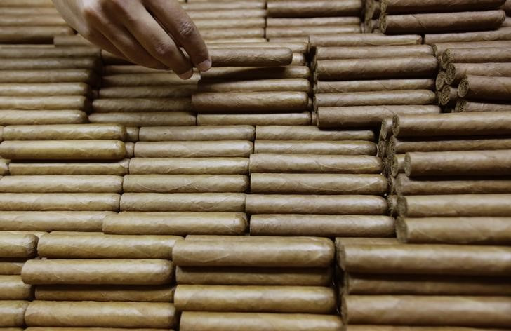A worker sorts cigars at the H. Upmann factory in Havana