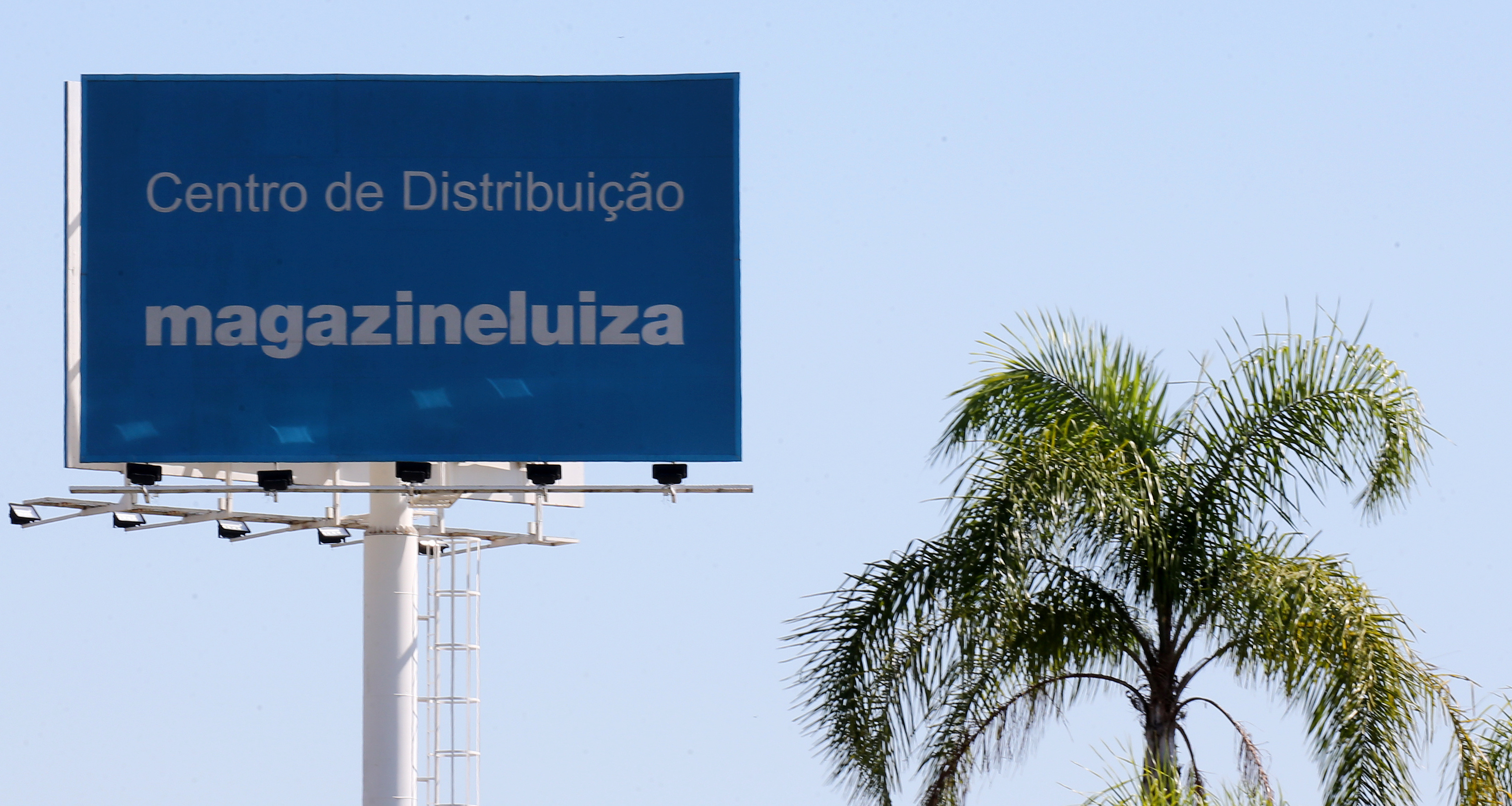 The logo of retail Magazine Luiza S.A. is seen in their logistics center in Louveira