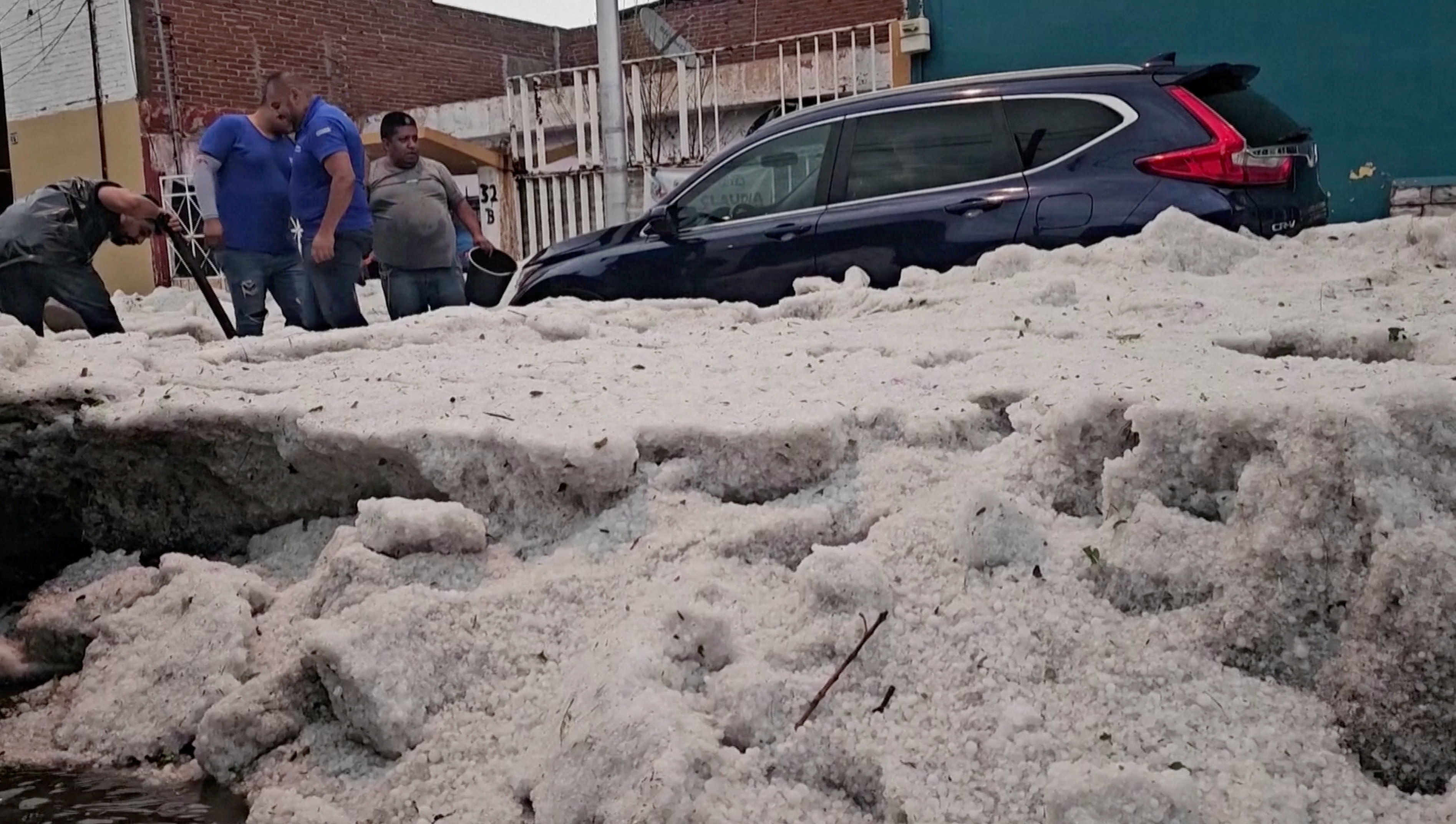 Hailstorm covers Mexican streets with thick ice amid heat wave