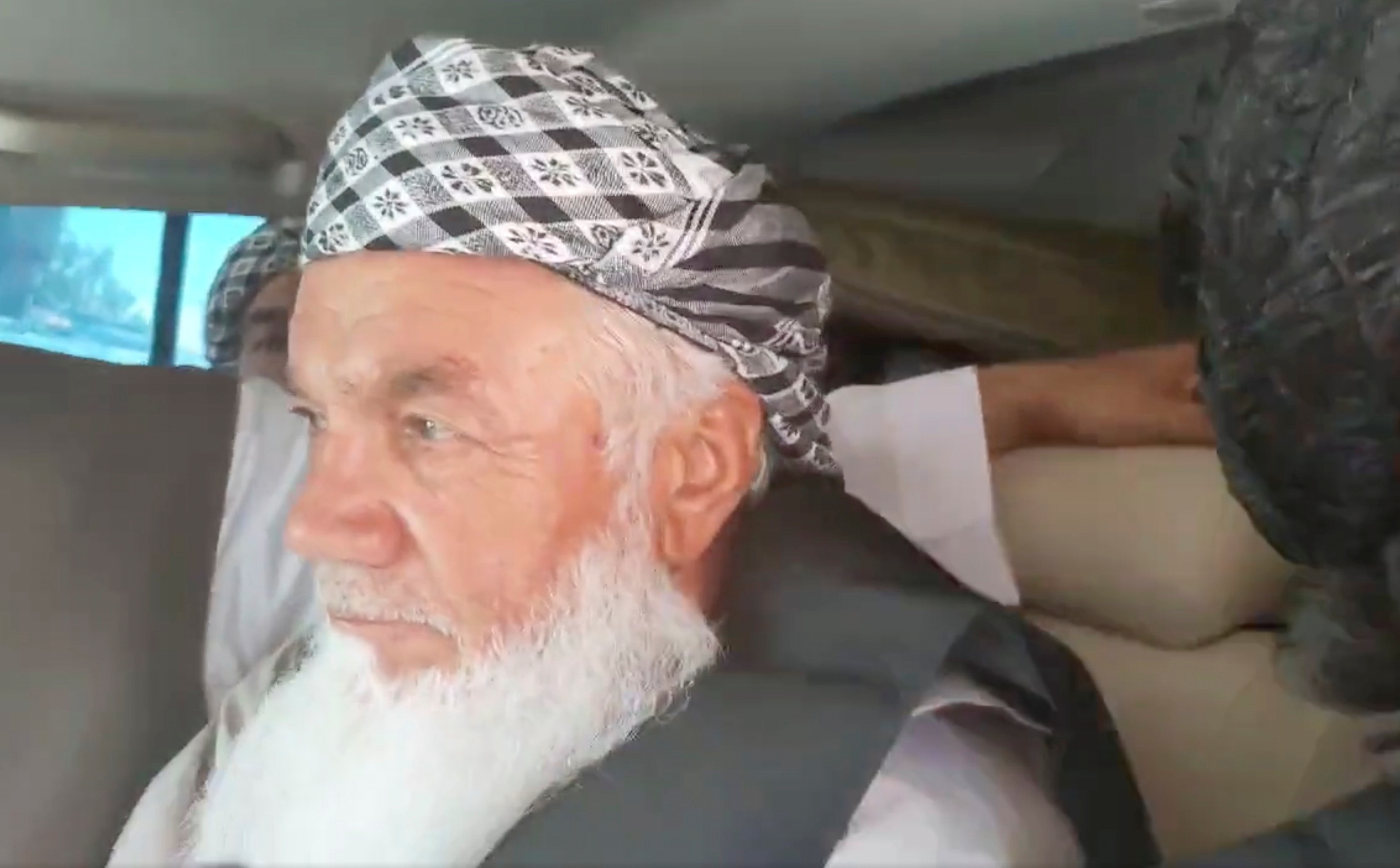 Ismail Khan, a veteran local commander leading militia resistance in Herat, Afghanistan, speaks to a Taliban media arm while in their custody, in this screen grab taken from an undated video from social media uploaded on August 13, 2021. TALIBAN HANDOUT/via REUTERS