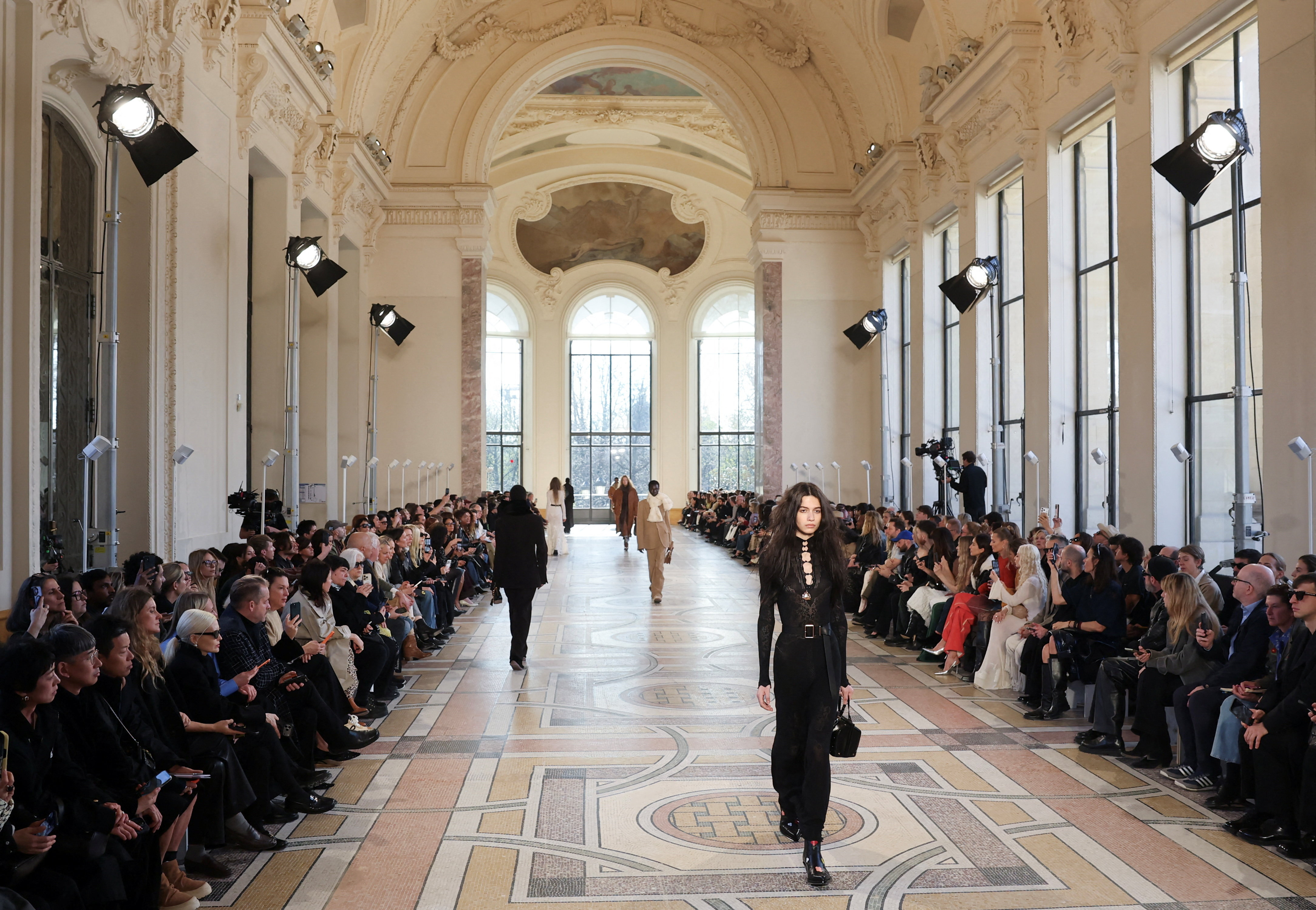 Louis Vuitton brings folklore and fur to the Louvre for fall