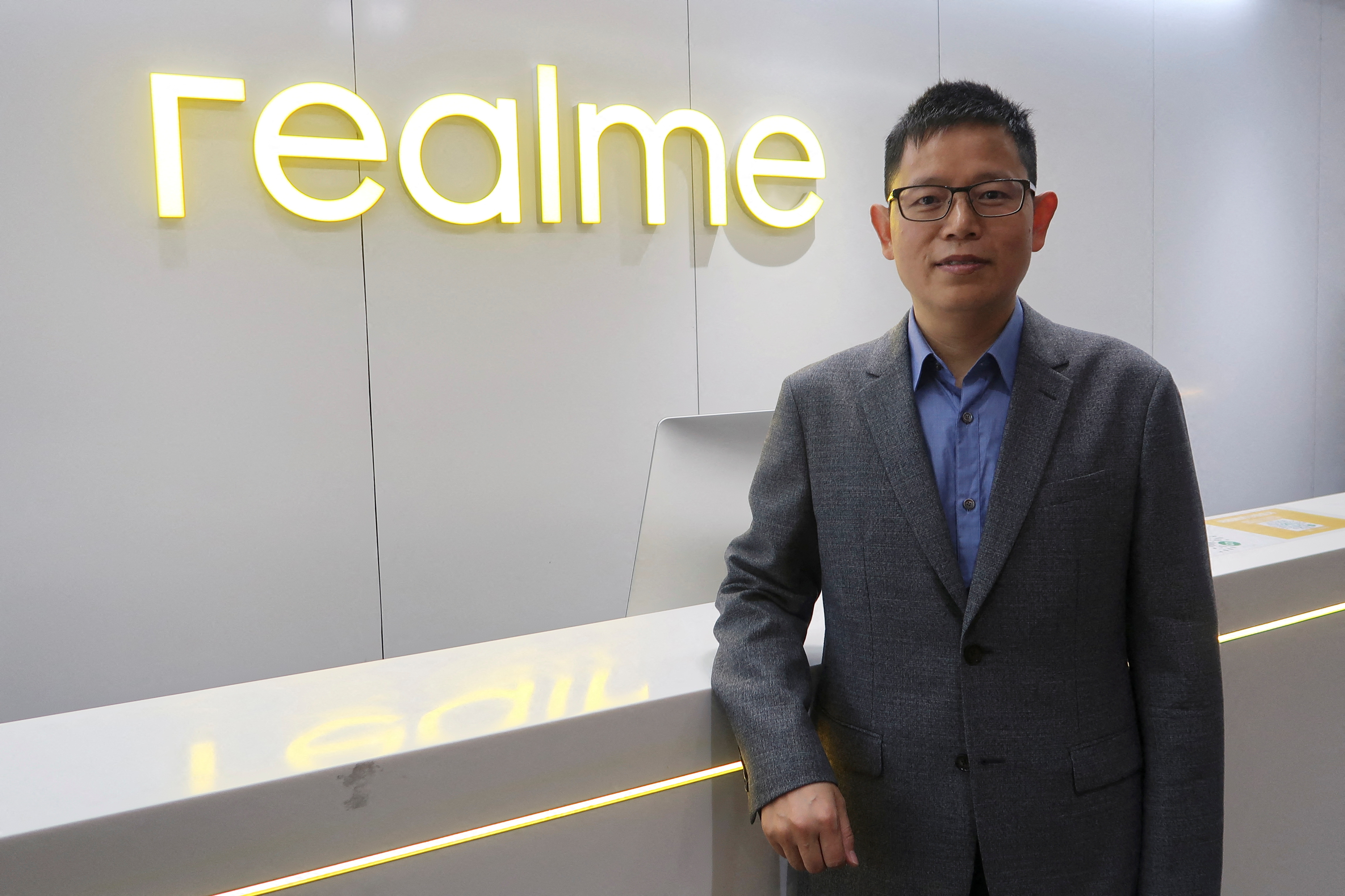 Realme CEO and founder Sky Li poses for a picture during an interview with Reuters in Shenzhen