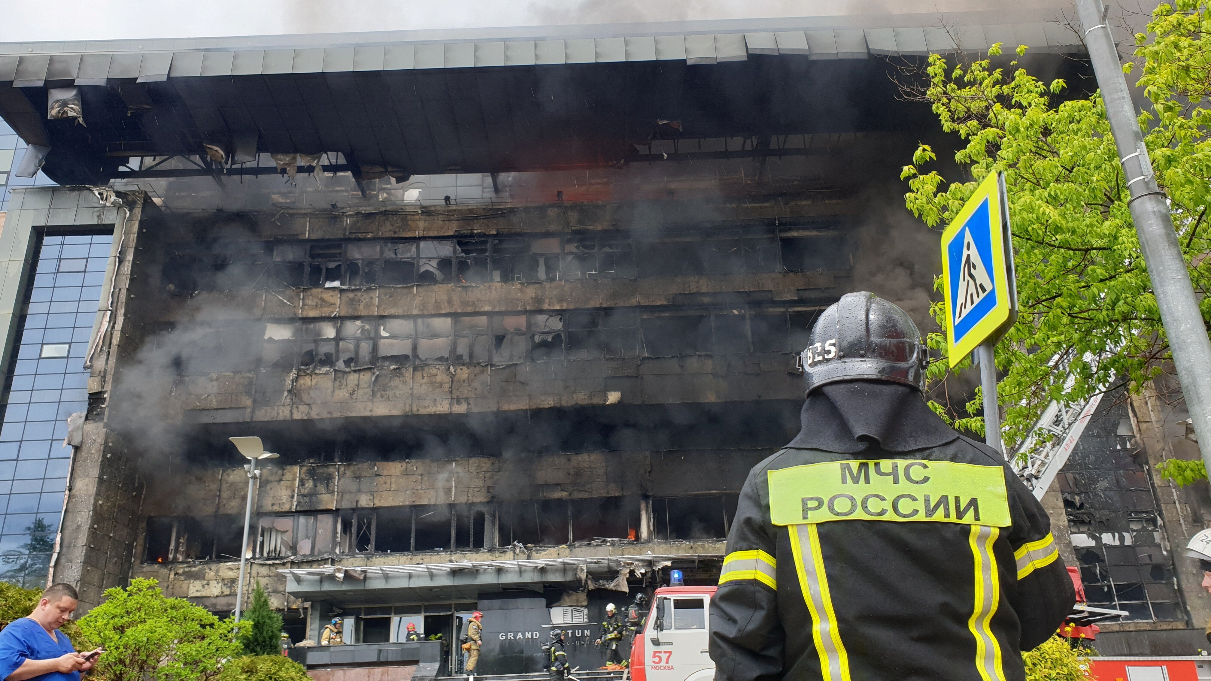 Firefighters extinguish a fire at a business centre in Moscow