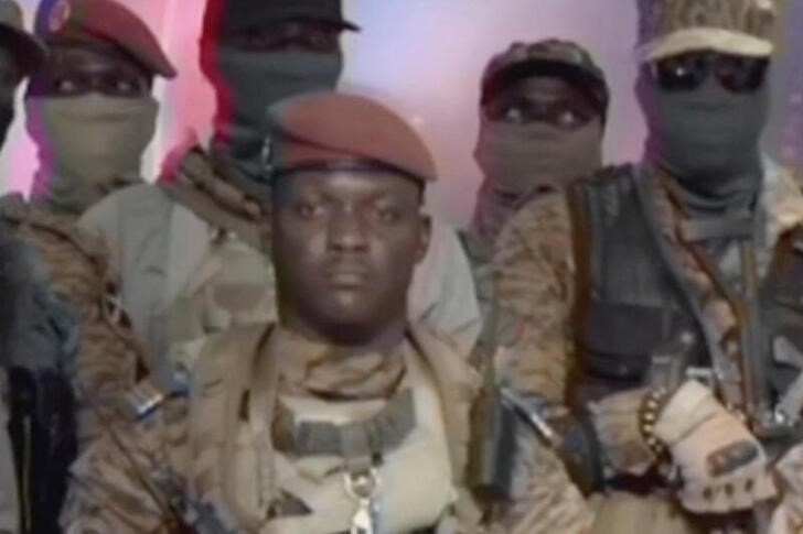 Captain Ibrahim Traore looks on during the announcement on television that he has ousted Burkina Faso's military leader Paul-Henri Damiba and dissolved the government and constitution, in Ouagadougou