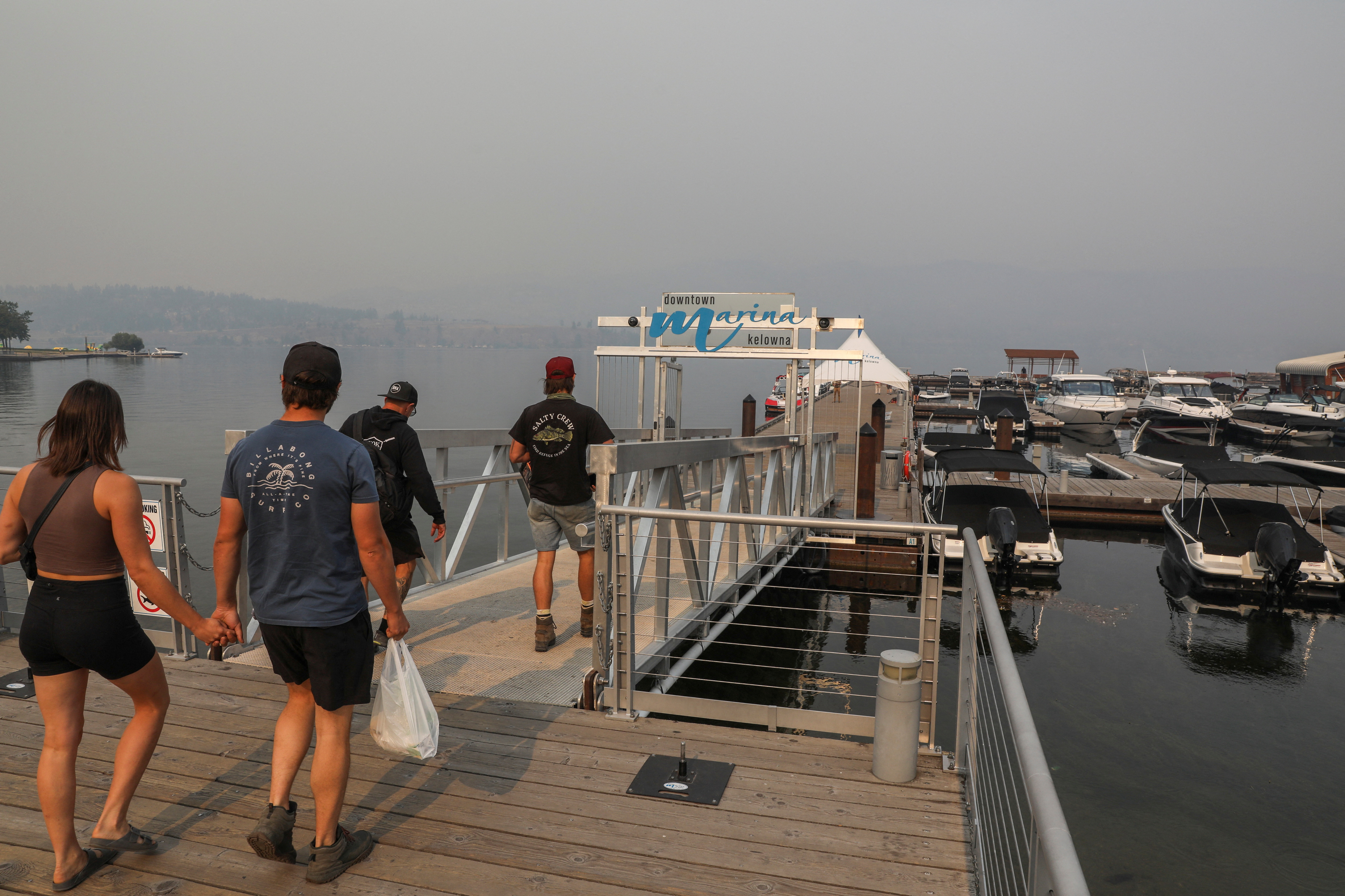 Smoke from wildfires hangs low over Lake Okanagan in Kelowna