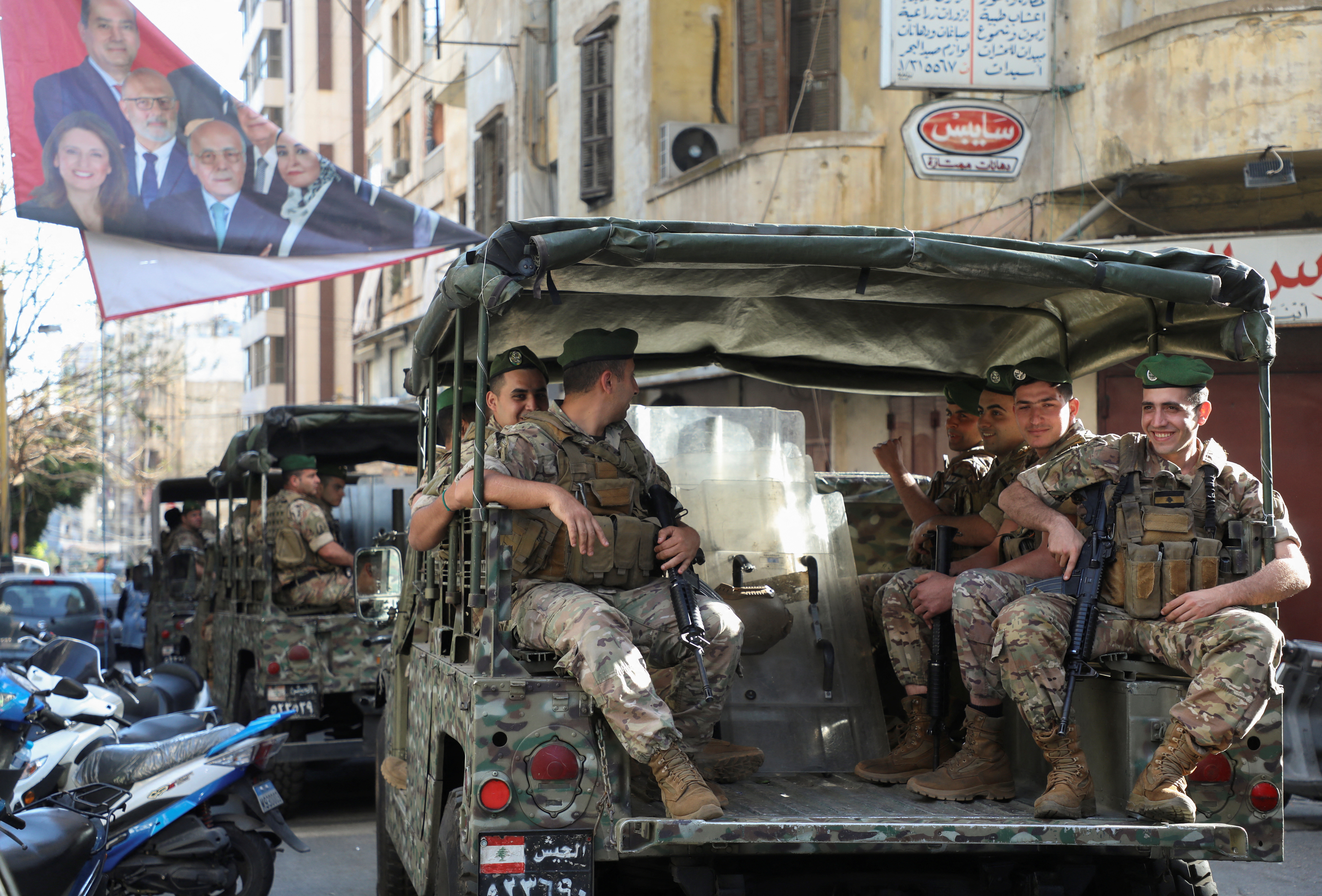 Lebanese army patrol near a polling station during Lebanon's parliamentary election, in Beirut