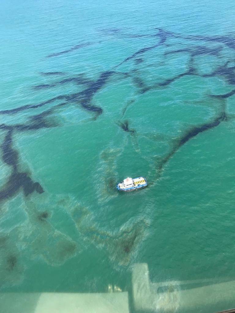 Ecuador oil spill blamed on 'human error' sullies waters, local beach