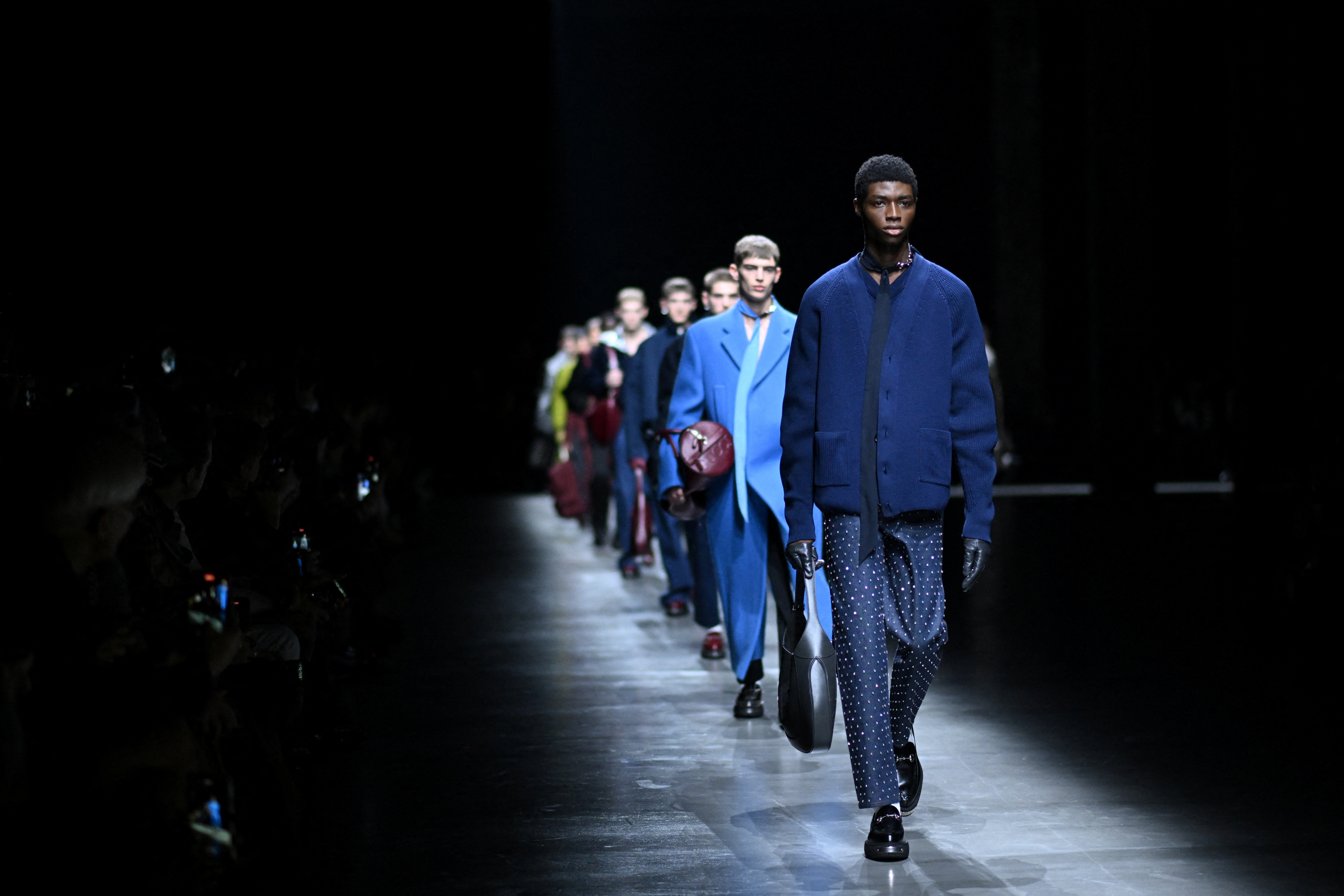 Gucci opens Milan Fashion Week with De Sarno's dressy looks for men |  Reuters