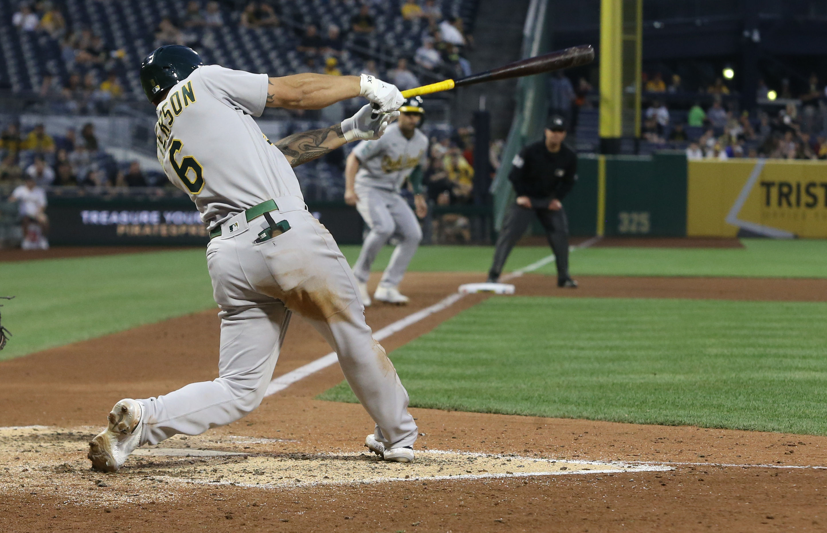 A's sock four homers, batter Pirates to end skid