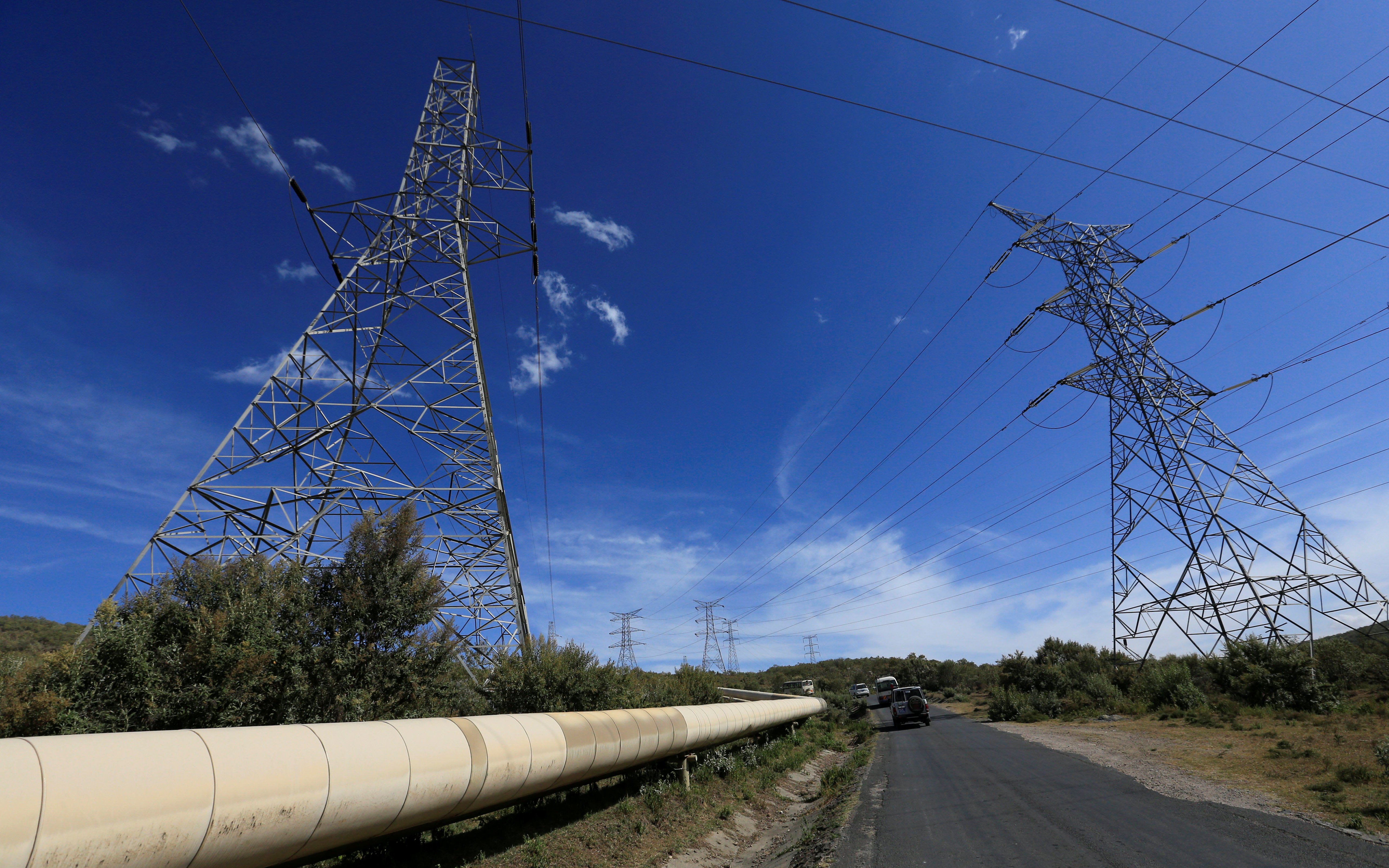 Pylons of high-tension electricity power lines are seen at the Olkaria II Geothermal power plant near the Rift Valley town of Naivasha
