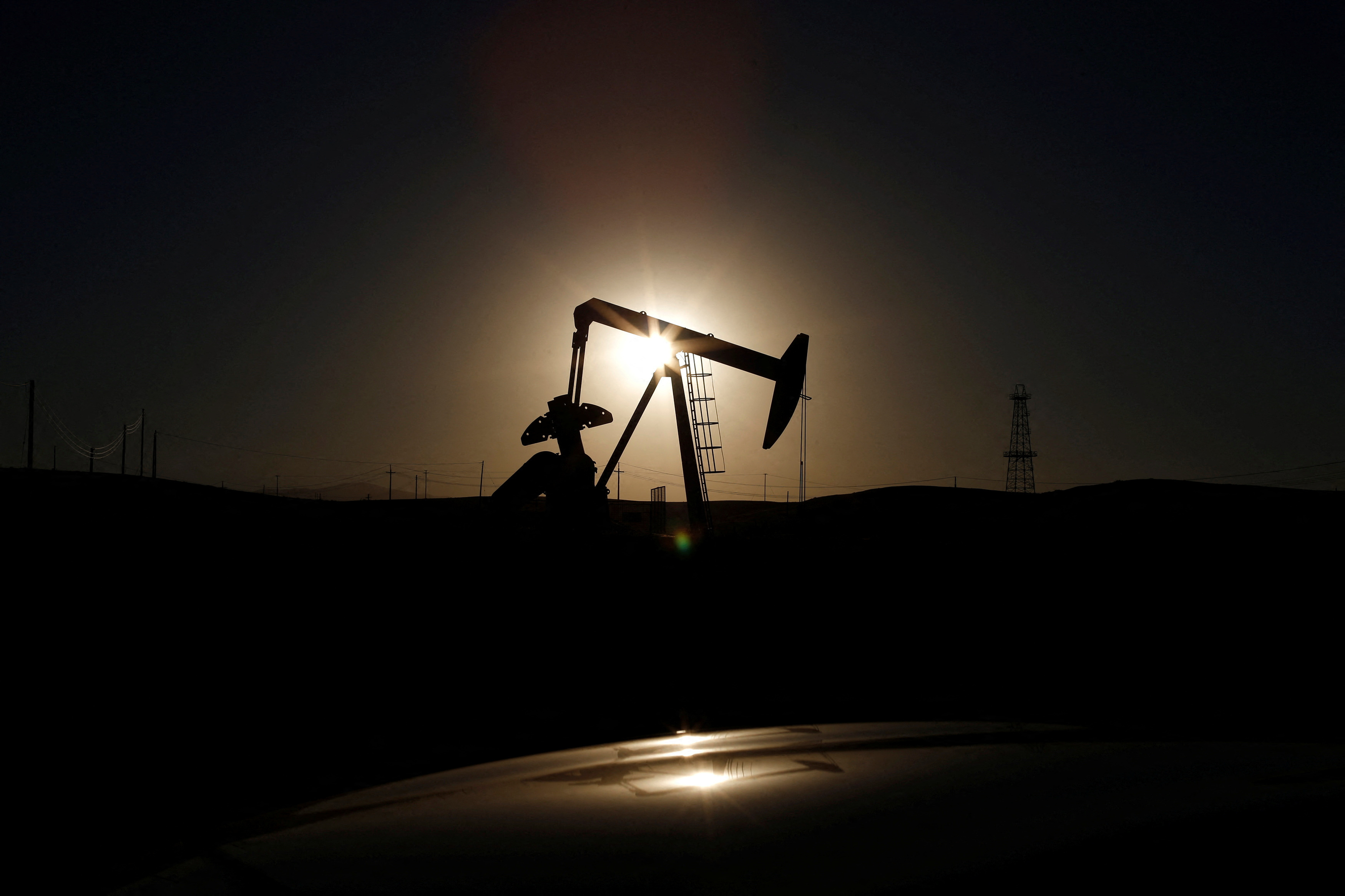 A pump jack is seen at sunrise near Bakersfield