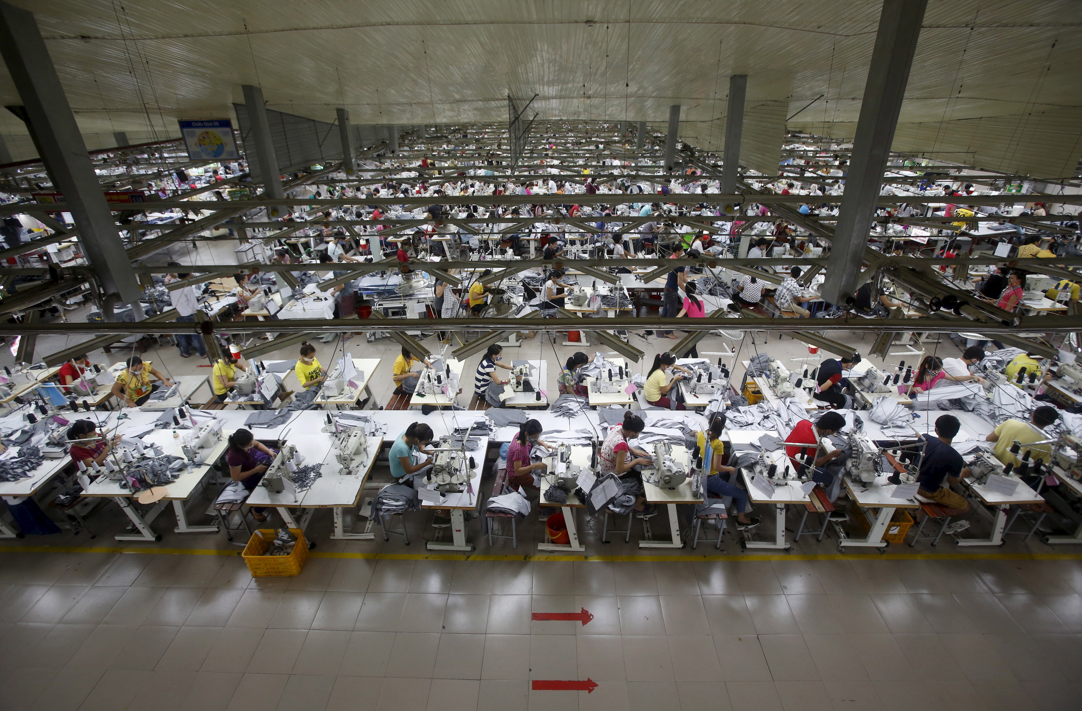 Labourers work at a garment factory in Bac Giang province, near Hanoi
