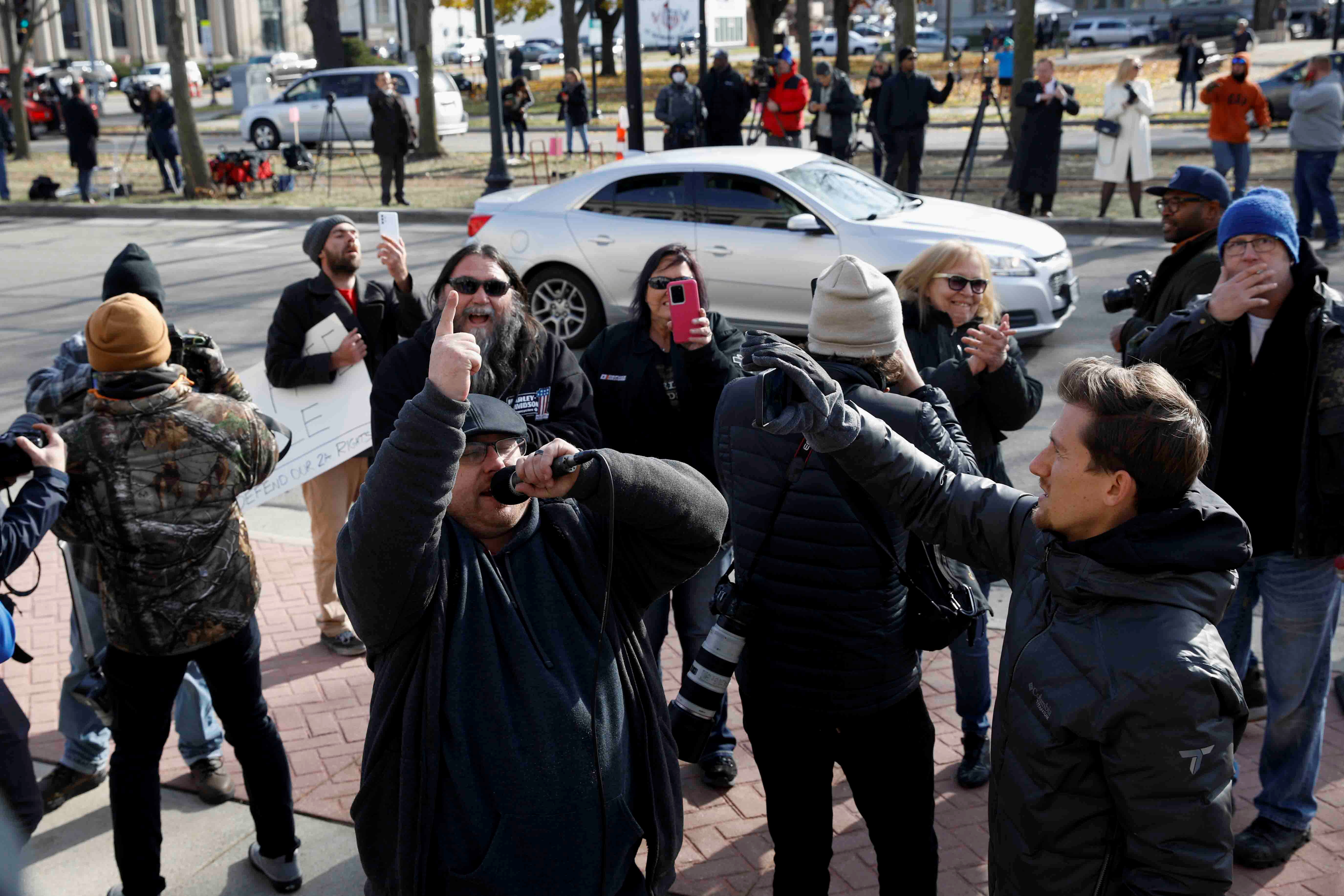 People react to the verdict in the trial of Kyle Rittenhouse, outside the Kenosha County Courthouse in Kenosha, Wisconsin, U.S., November 19, 2021. REUTERS/Brendan McDermid