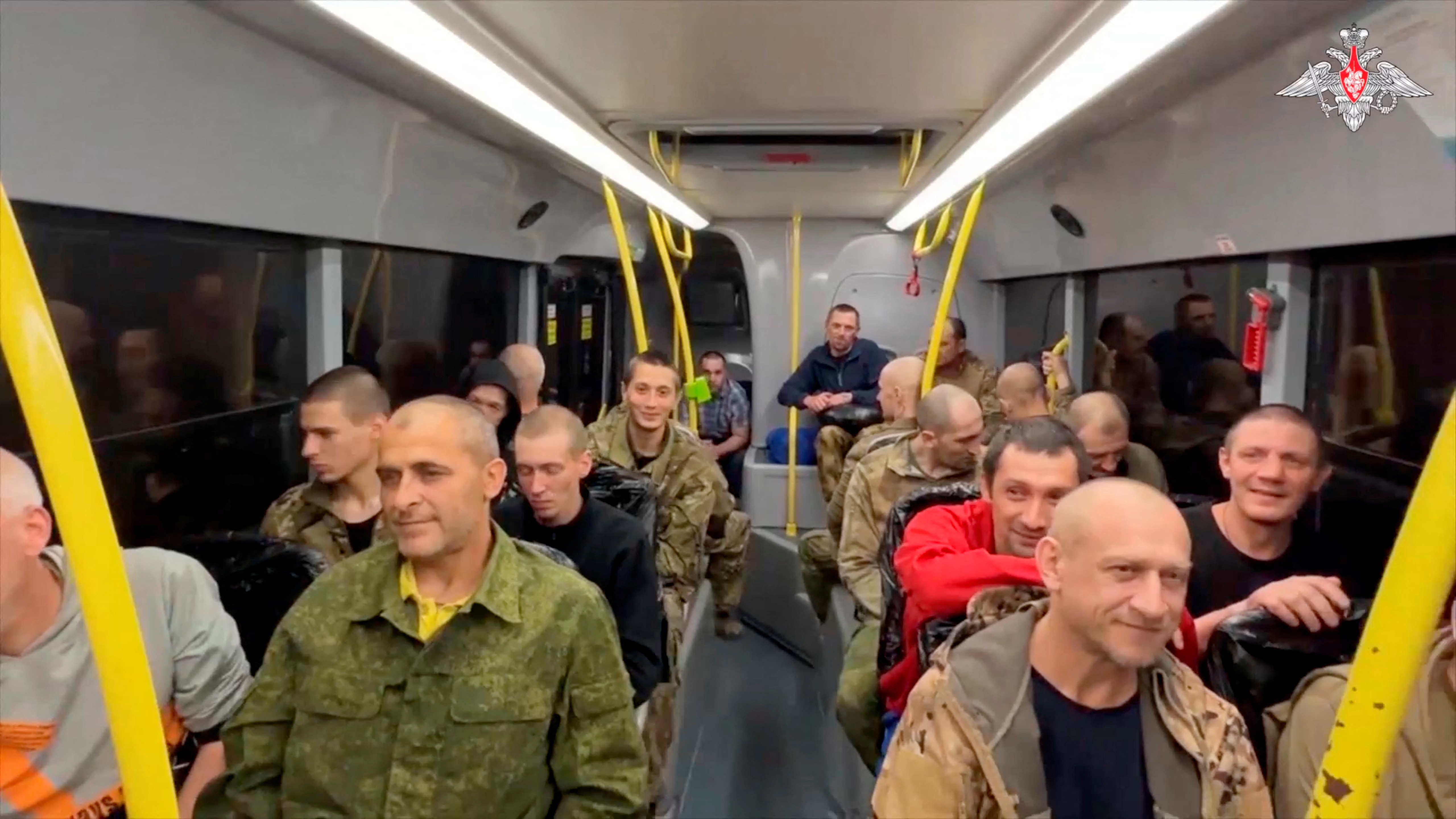 A still image from a video shows what it said to be captured Russian service personnel in a bus following the latest exchange of prisoners of war at an unknown location in the course of Russia-Ukraine conflict