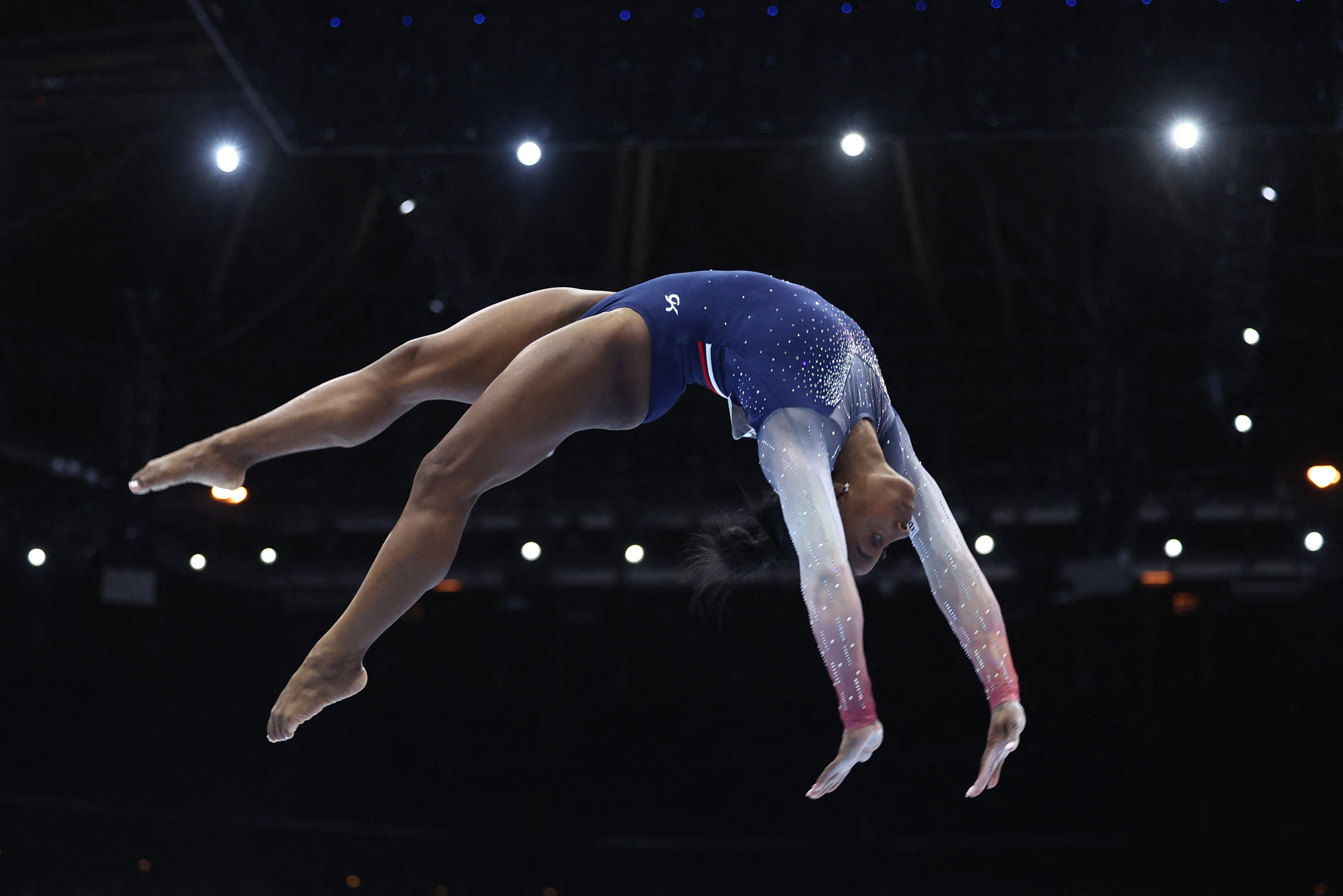 US women's gymnastics team wins world title and punches its ticket to 2024  Olympics - The Boston Globe