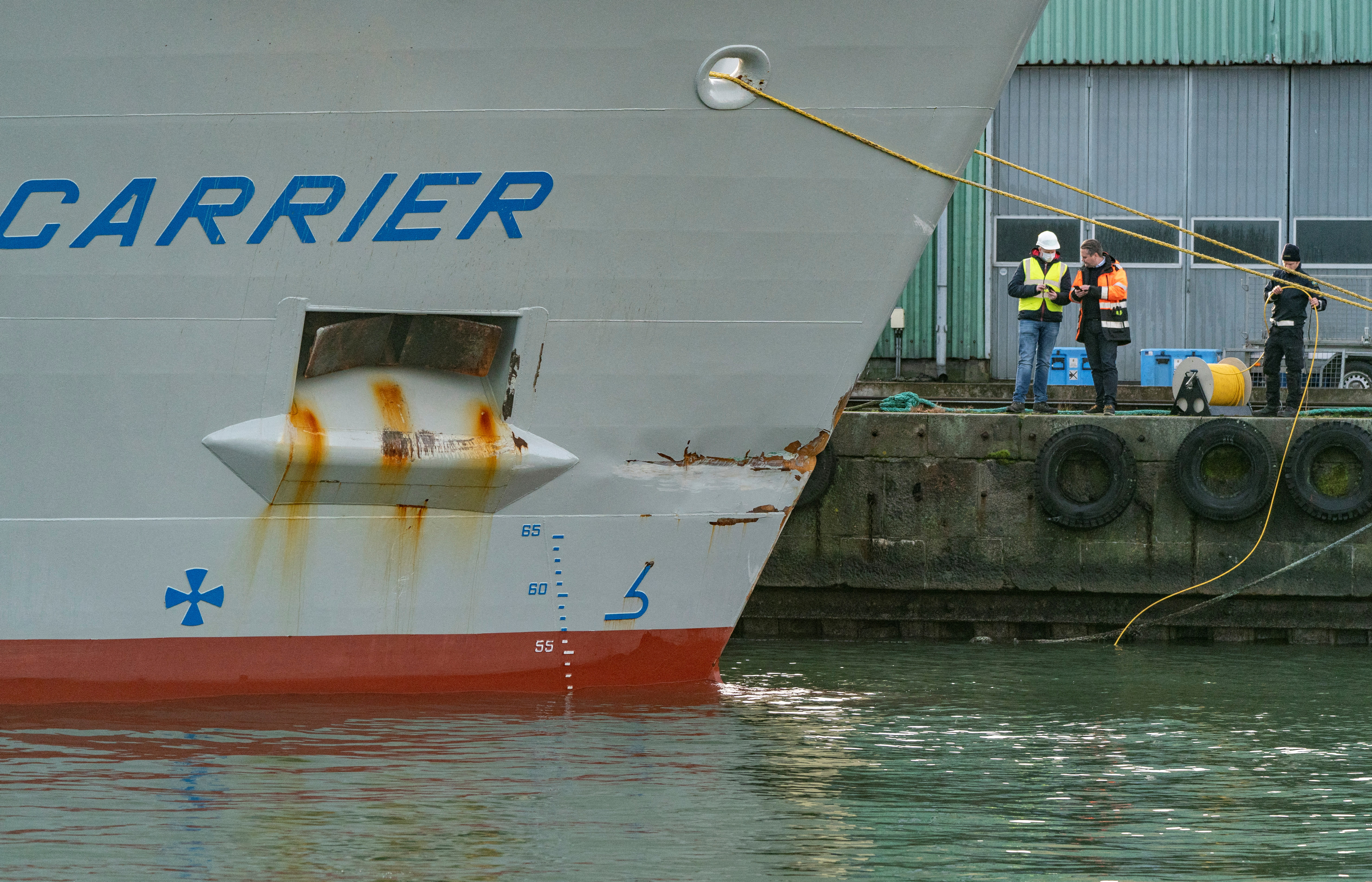 Swedish Coast Guard investigate damaged British cargo vessel Scot Carrier in the port of Ystad