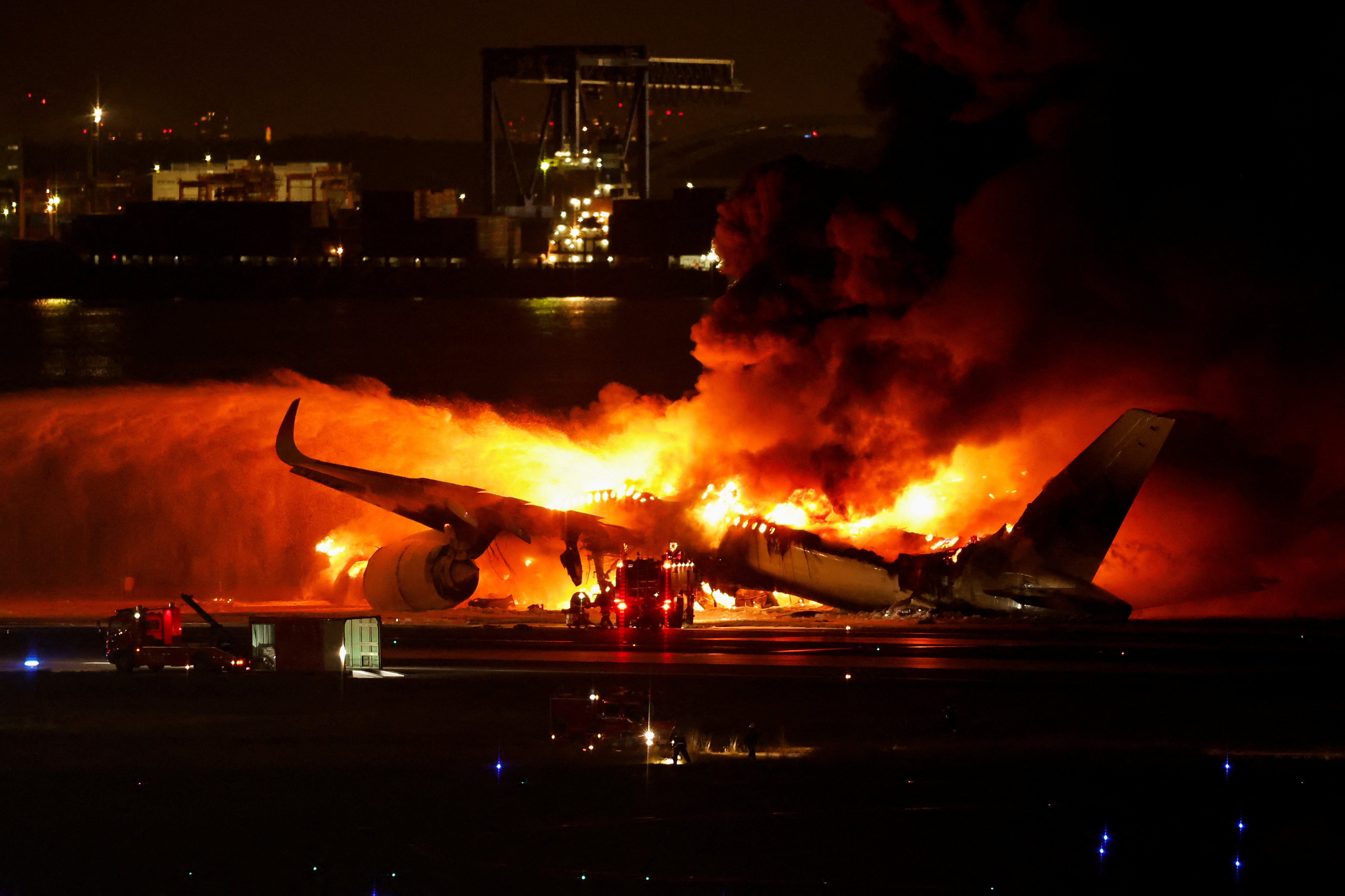 All passengers, crew escape blaze on Japan Airlines plane after Tokyo  airport collision | Reuters