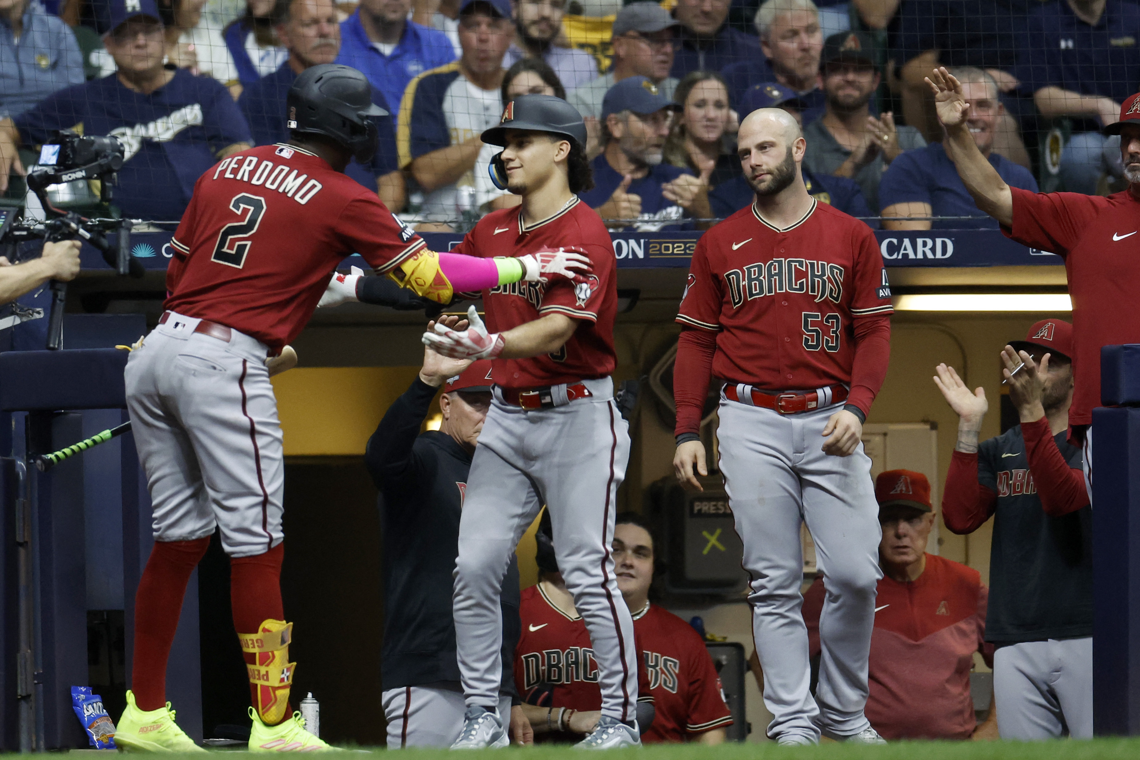 Arizona Diamondbacks' Craig Counsell celebrates with his teammates