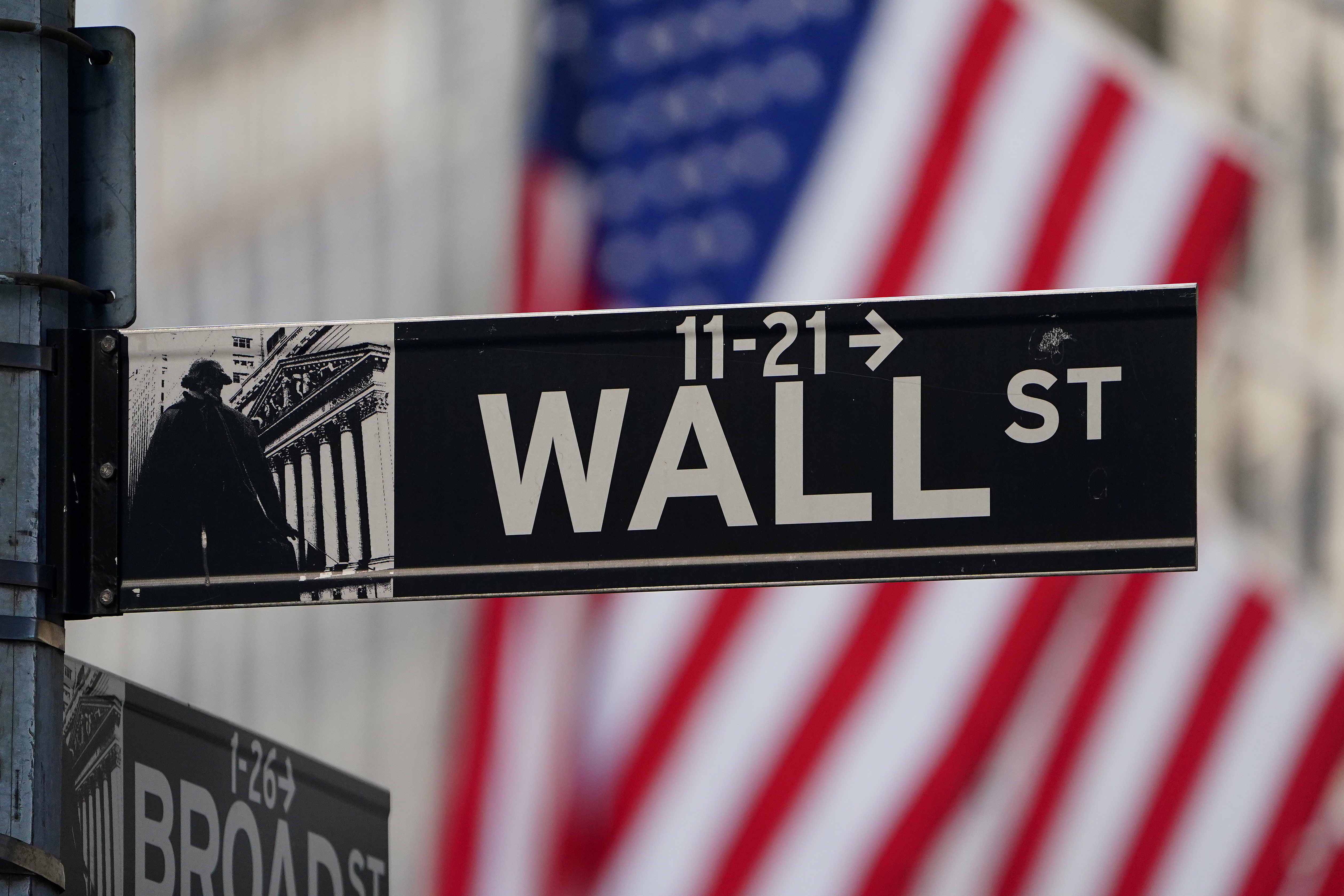The Wall Street sign is pictured at the New York Stock exchange (NYSE) in the Manhattan borough of New York City