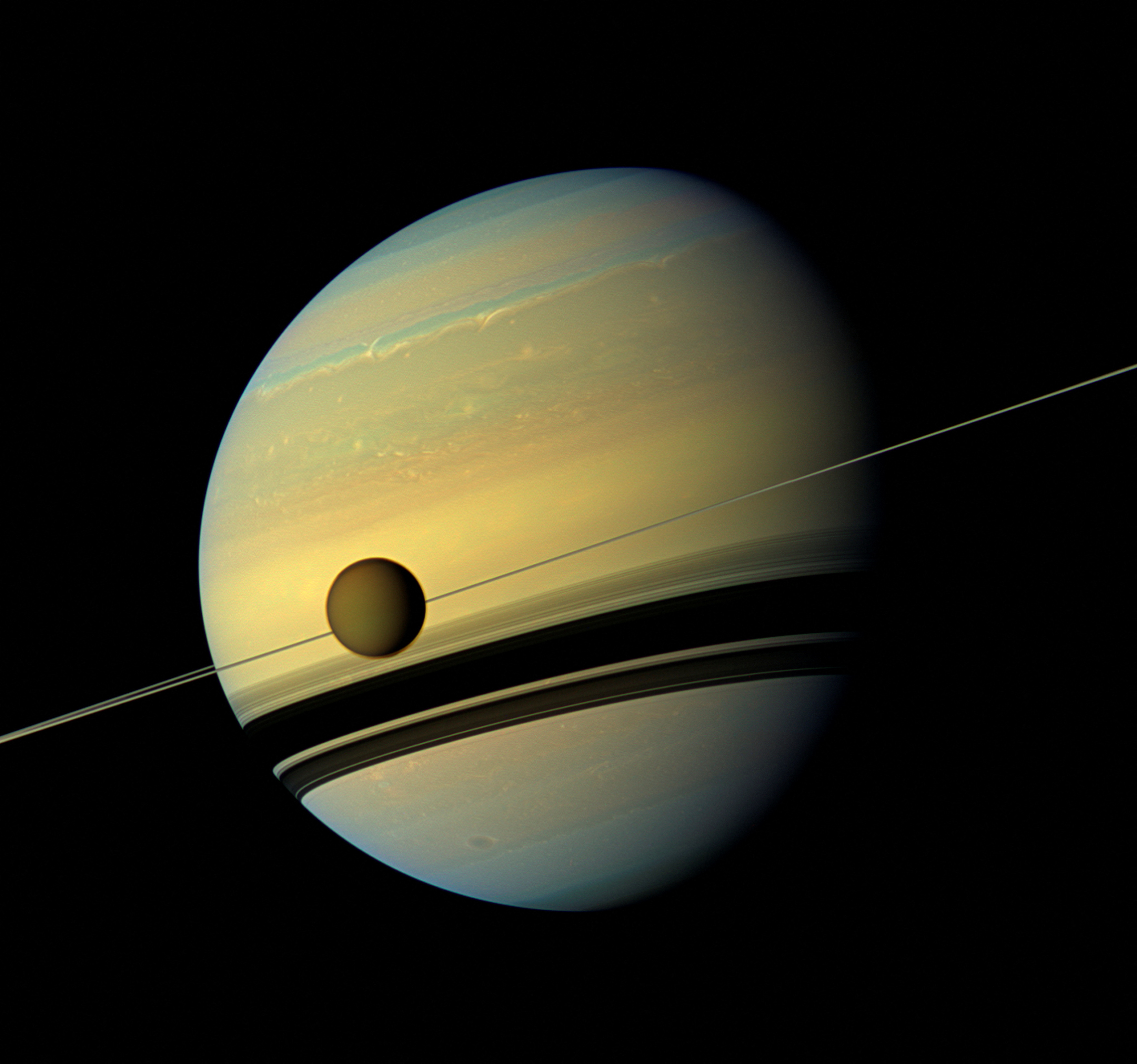 Handout of Titan, Saturn's largest moon in this natural color view from NASA's Cassini spacecraft