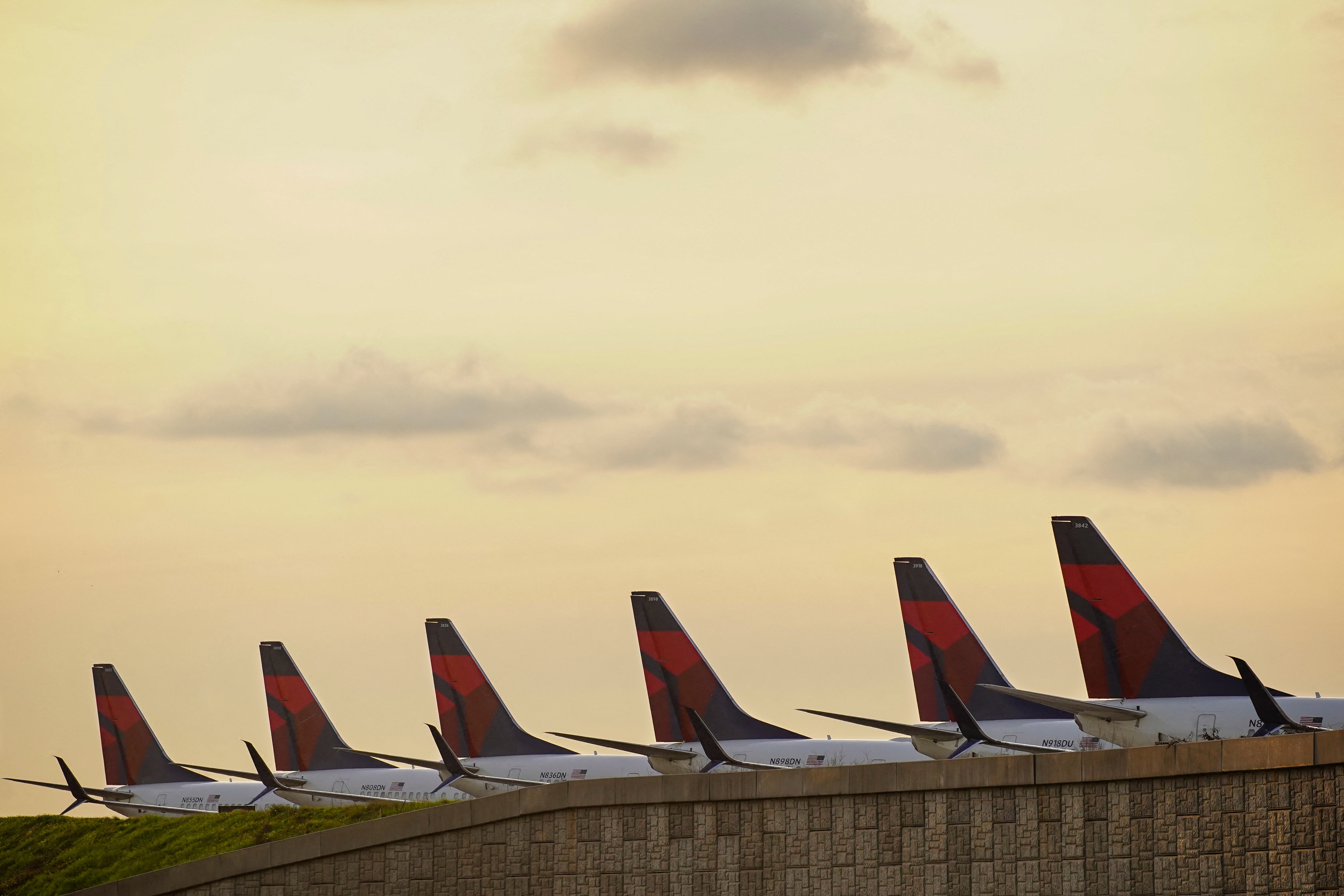 Delta Air Lines passenger planes crowd a runway in Atlanta