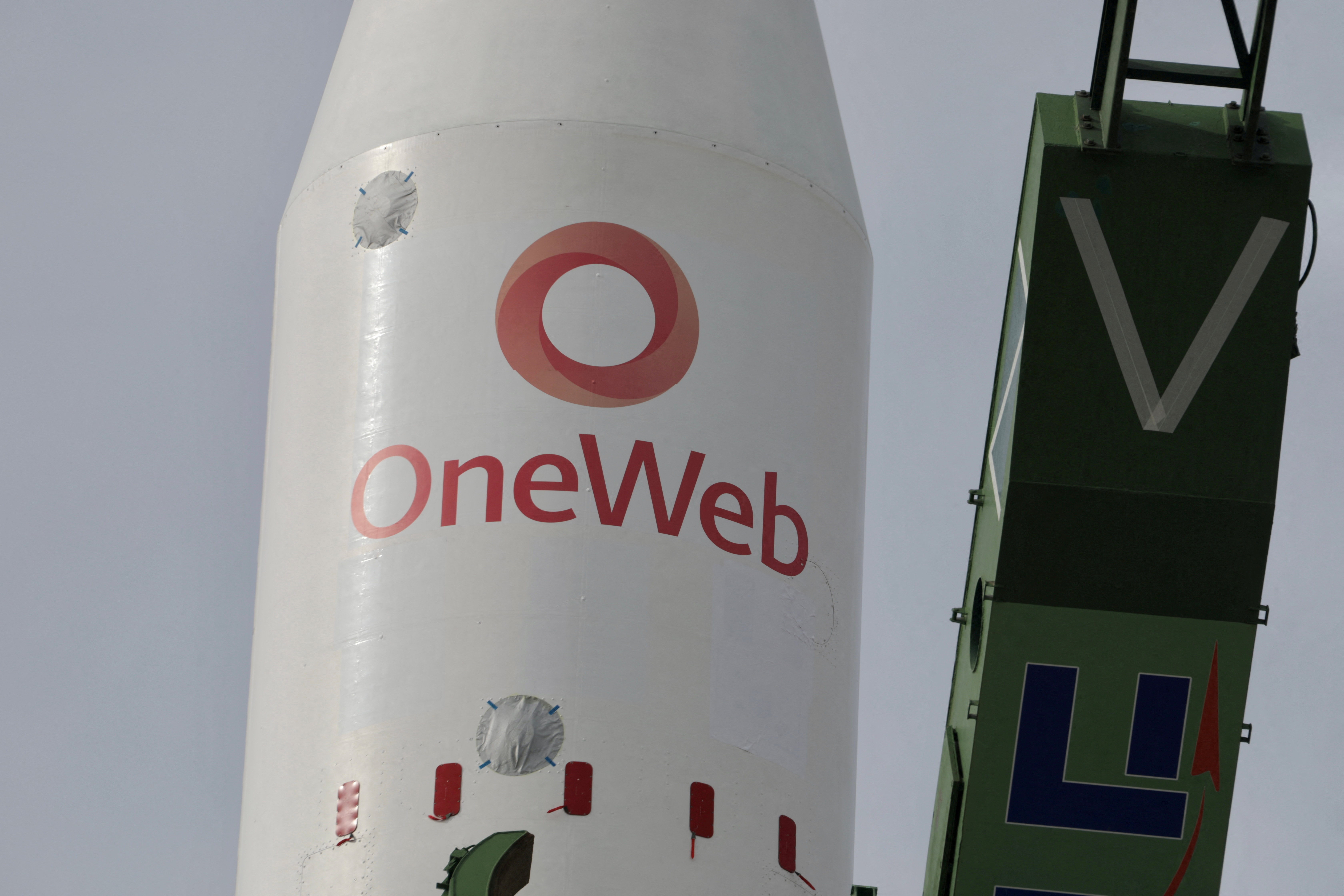 A Soyuz rocket with satellites of British firm OneWeb is removed from a launchpad at the Baikonur Cosmodrome