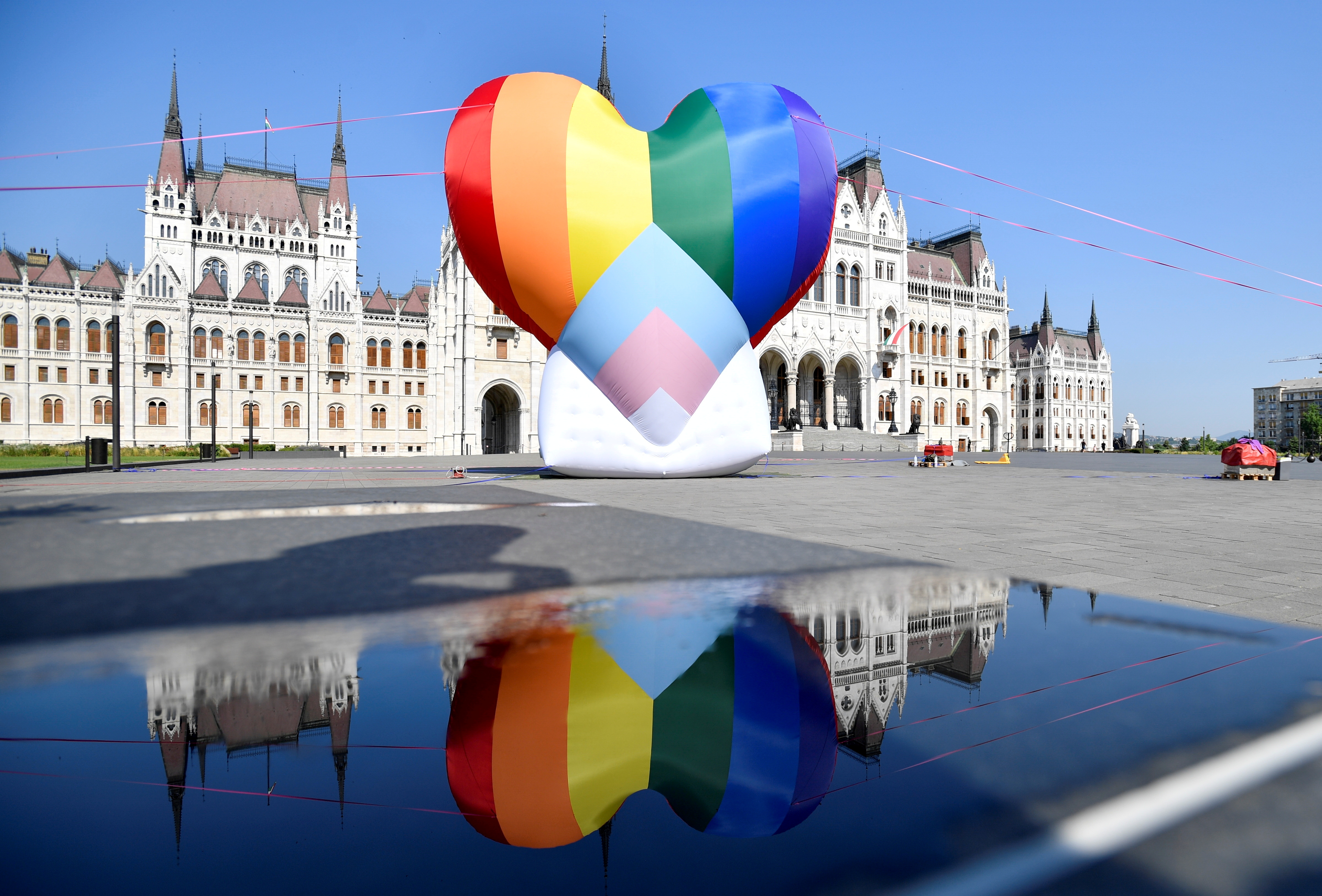 A huge rainbow baloon put up by members of Amnesty International and Hatter, an NGO promoting LGBT rights, is seen at Hungary's parliament in protest against anti-LGBT law in Budapest, Hungary, July 8, 2021. REUTERS/Marton Monus