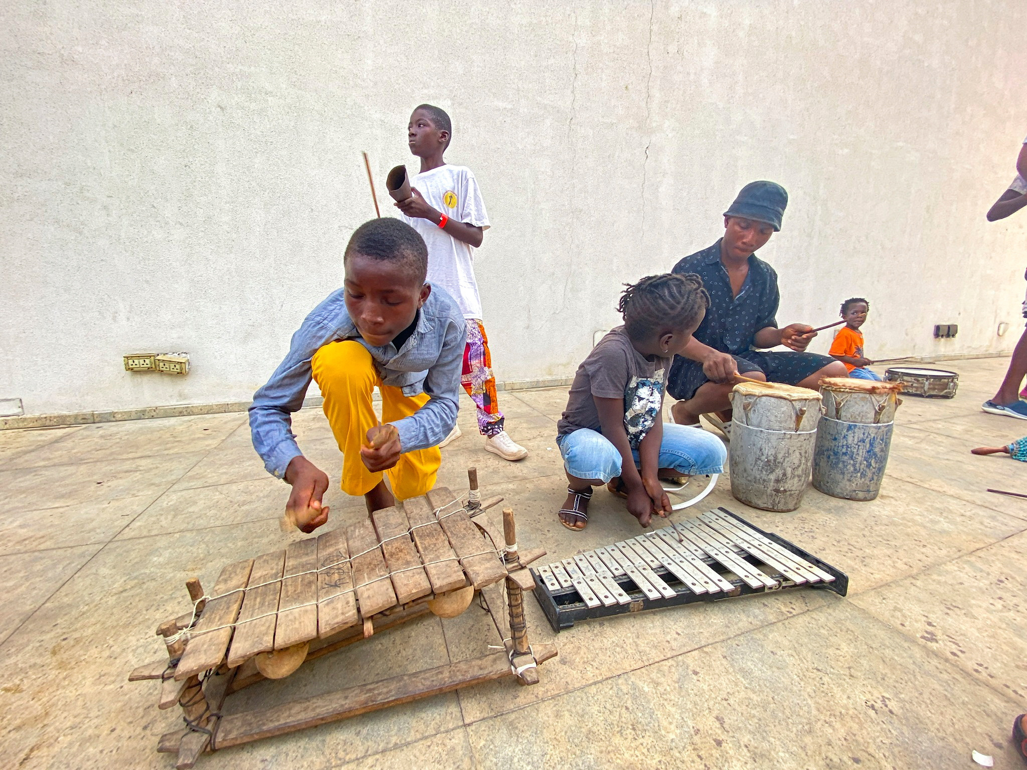 Children perform during a drumming workshop in Lagos