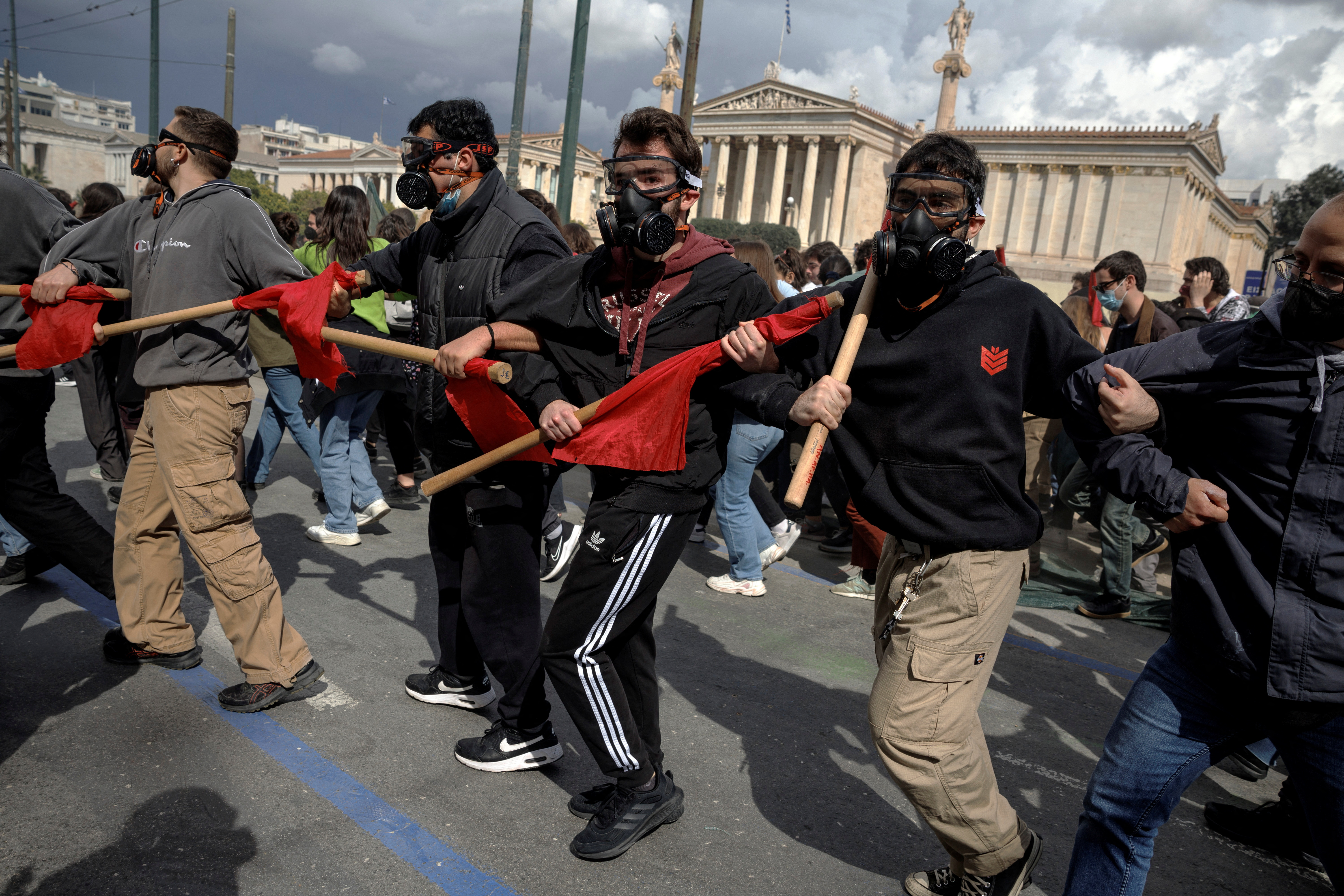Protesters clash with police during a demonstration after a train crash near the city of Larissa, in Athens