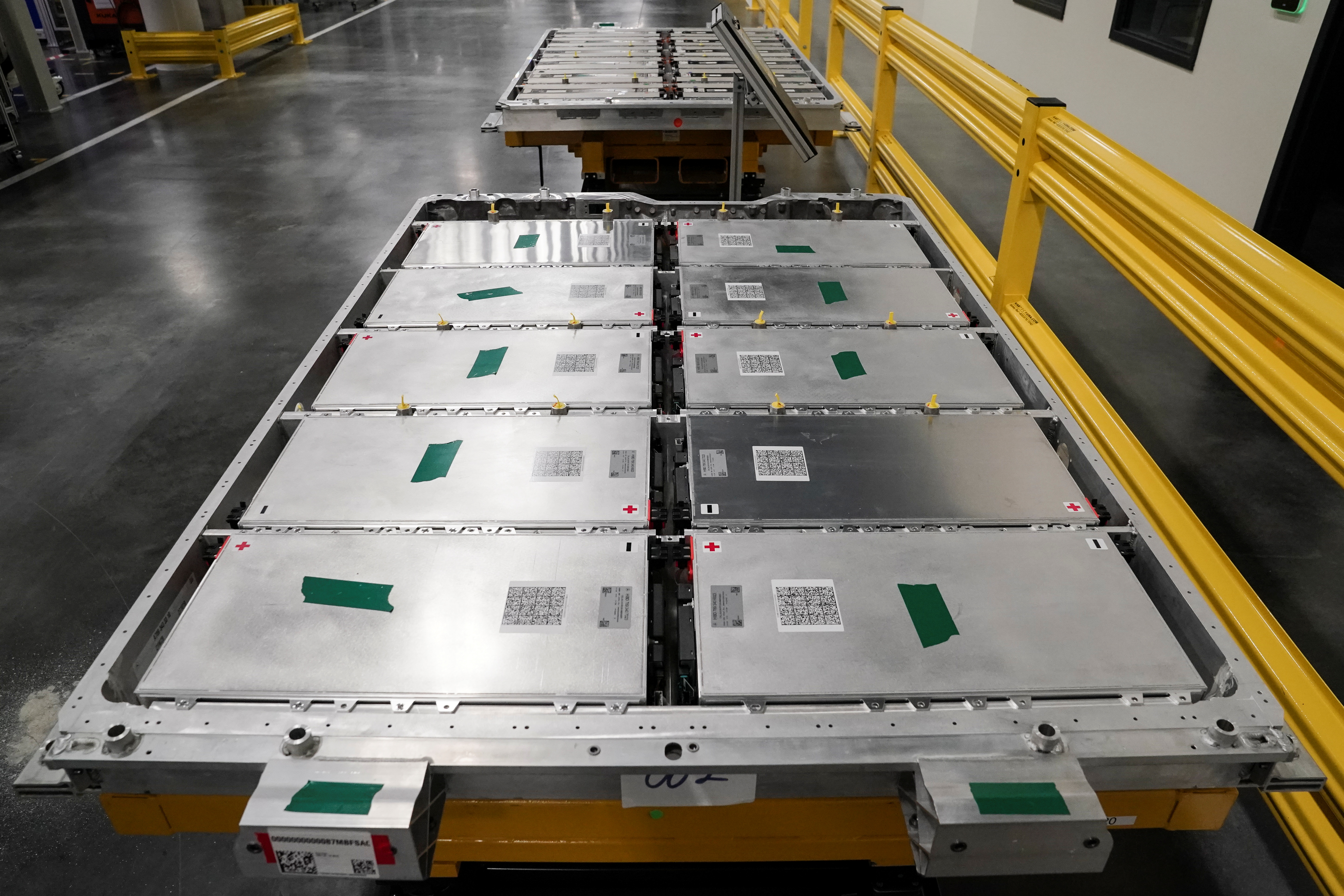 The electric vehicle battery tray assembly line is seen at the opening of the Battery Factory for the Mercedes-Benz plant in Alabama