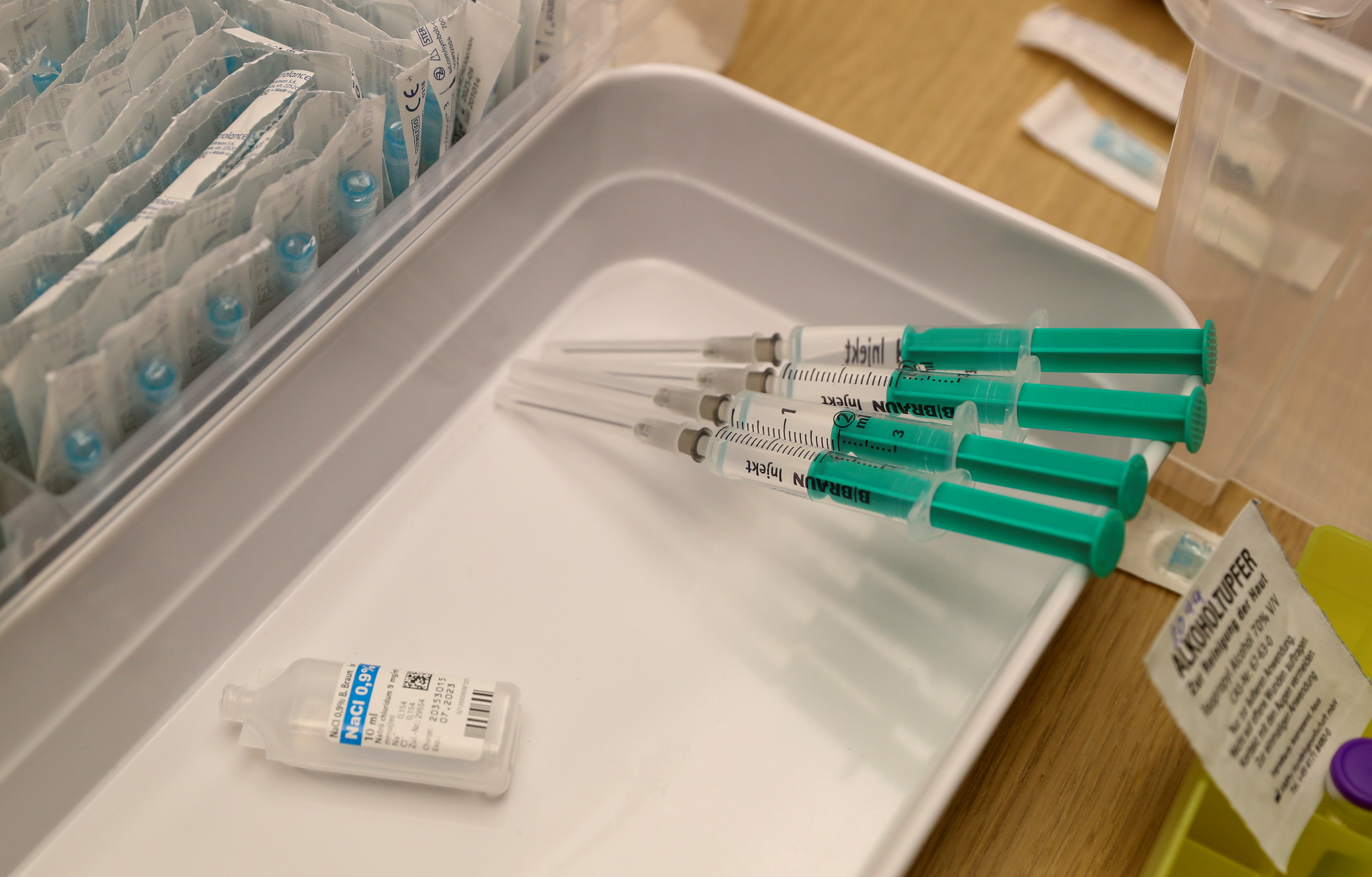Syringes containing Pfizer-BioNTech vaccine are seen at the Impfzentrum Basel Stadt vaccination center in Basel