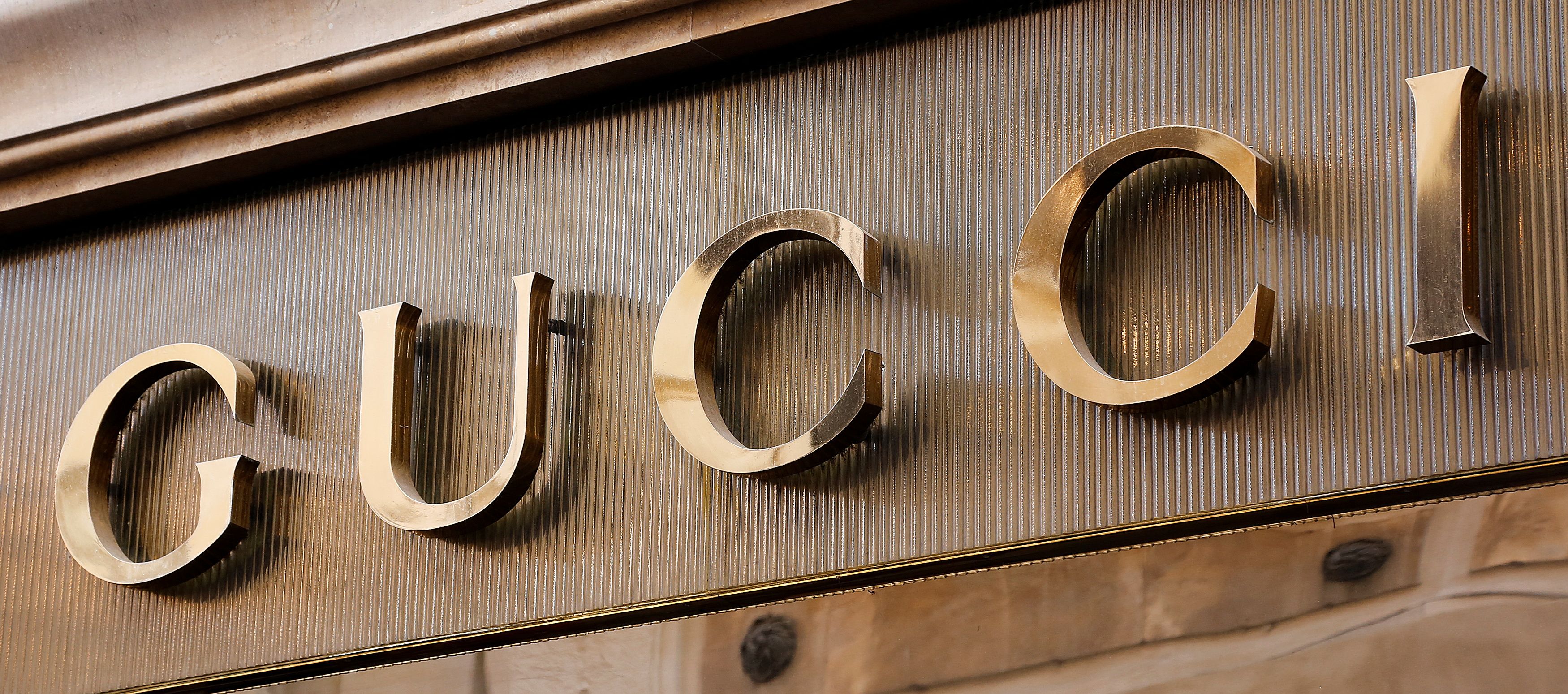 The logo of Gucci is seen in a shop in downtown Rome