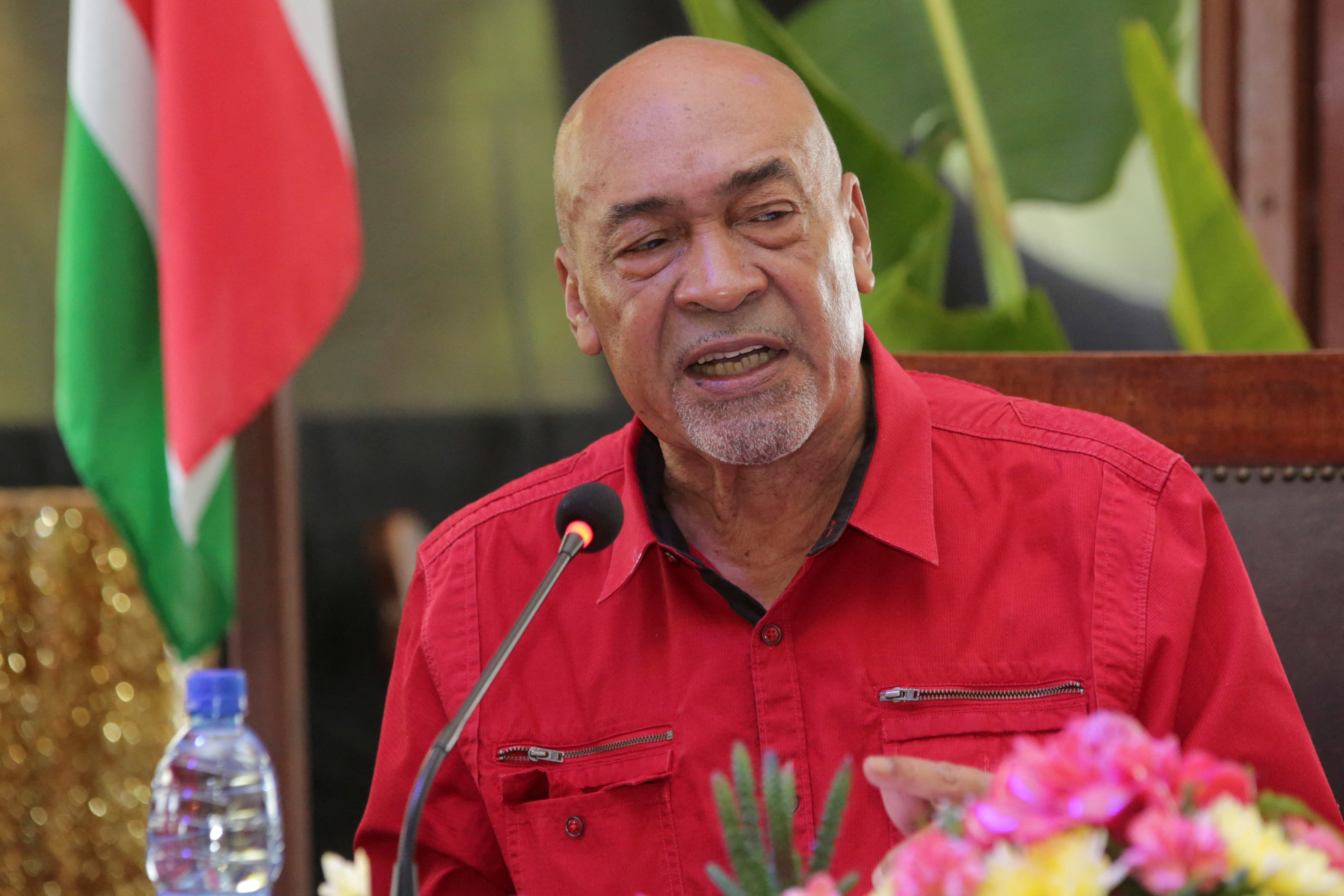 Former Suriname president Desi Bouterse speaks during a news conference in Paramaribo