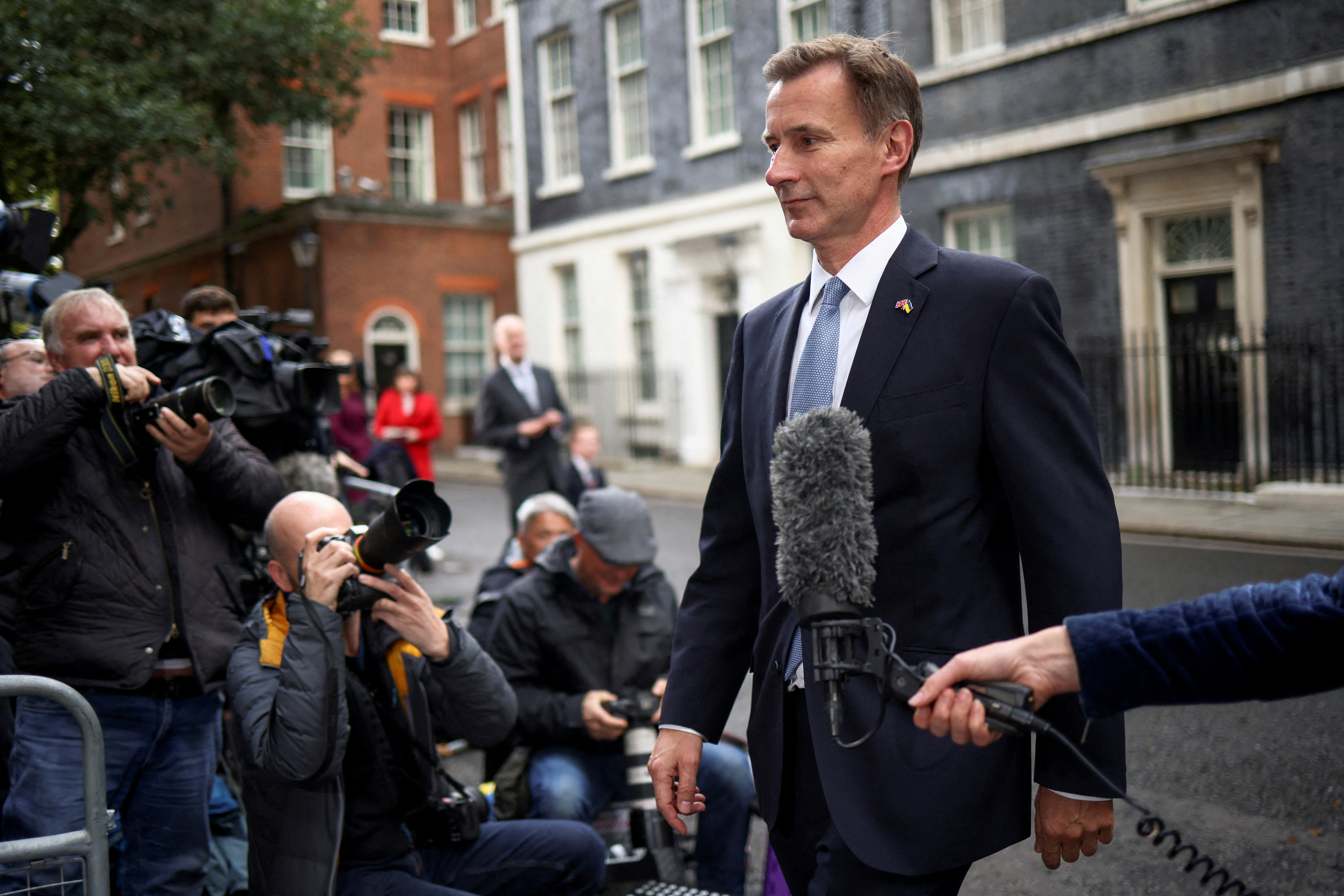 Jeremy Hunt walks outside Number 10 Downing Street in London