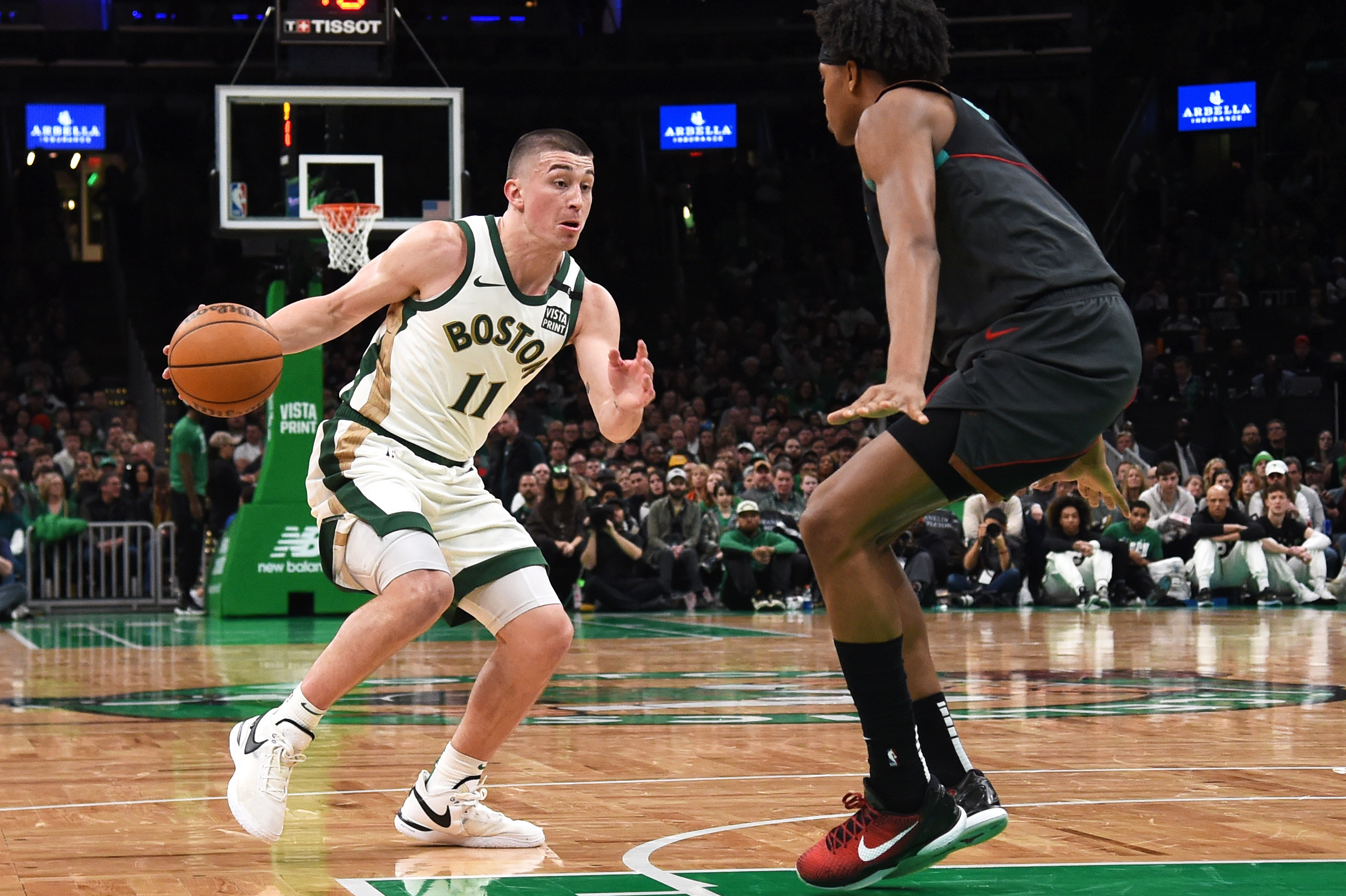 Jayson Tatum, Kristaps Porzingis Carry Celtics Past Wizards | Reuters