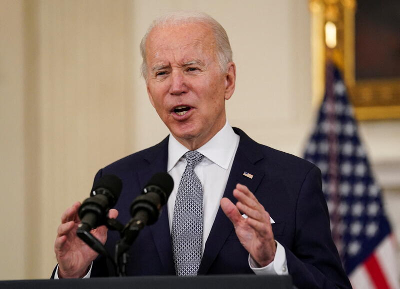 FILE PHOTO: U.S. President Joe Biden delivers speaks about December 2021 jobs report at the White House in Washington