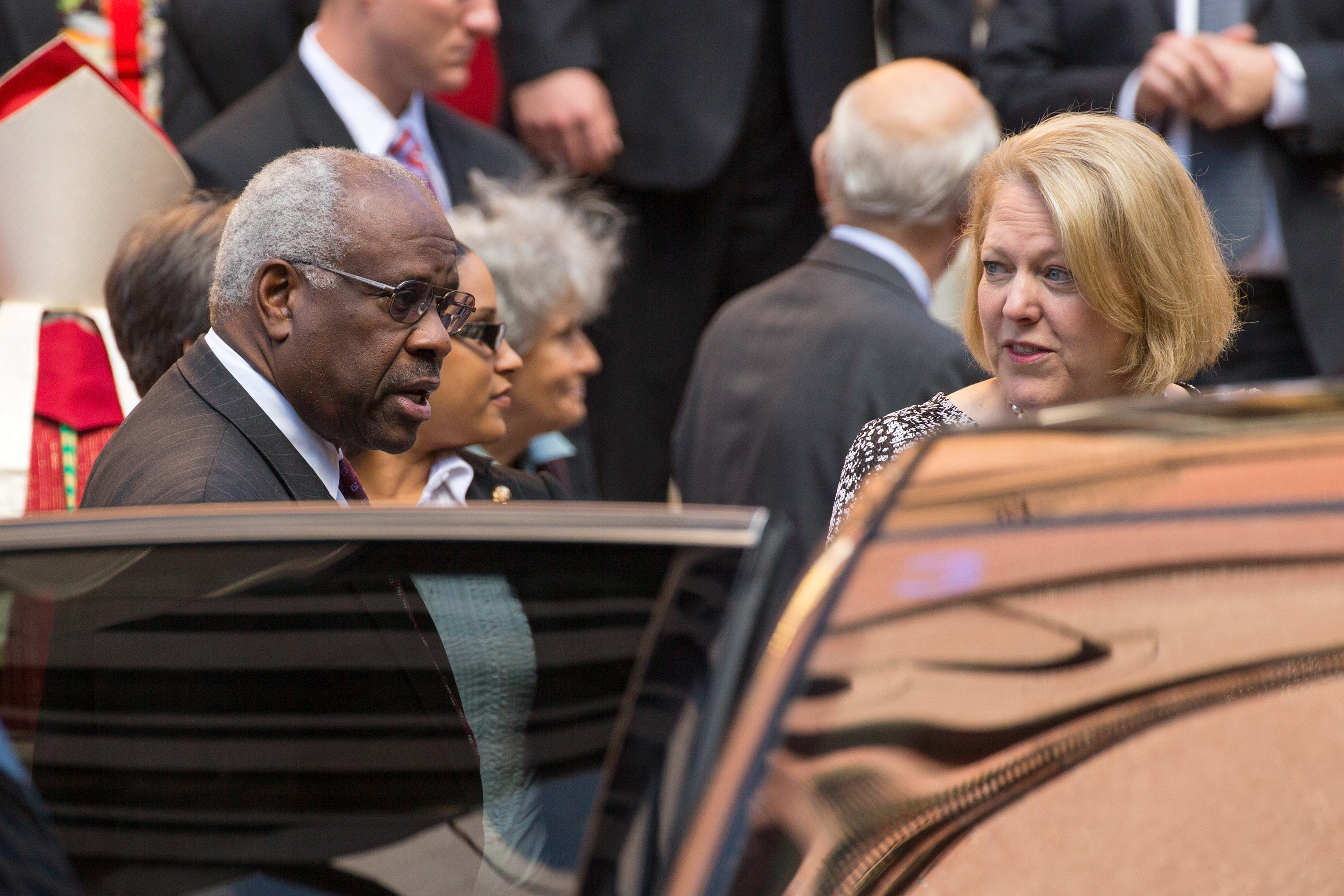 Justice Thomas and his wife exit following the Red Mass at the Cathedral of St. Matthew the Apostle in Washington