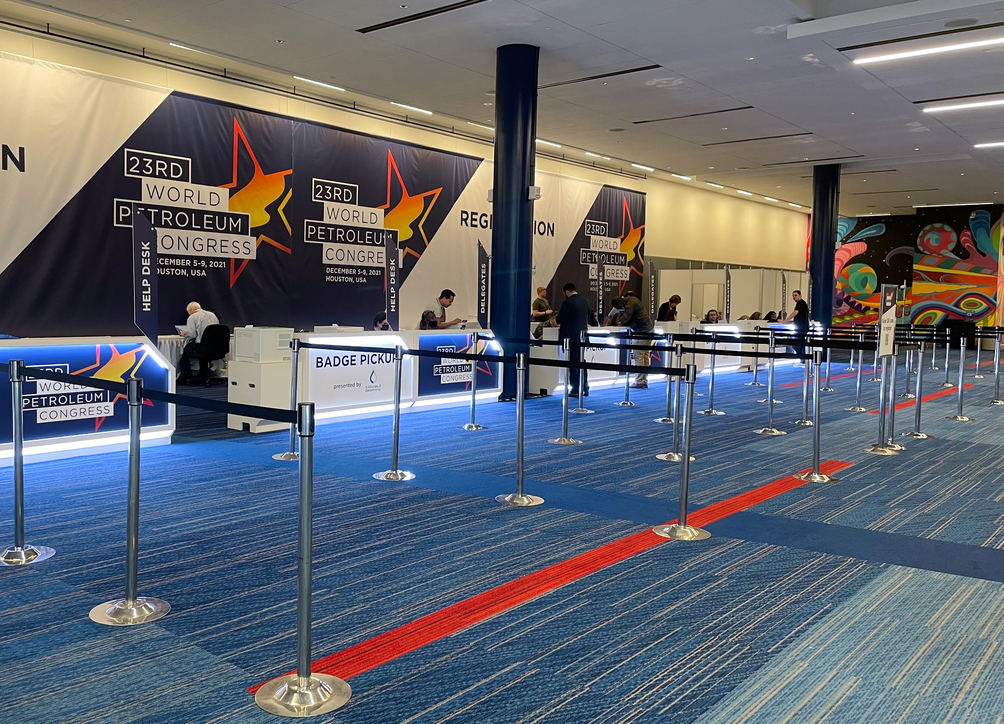 A view of a quiet registration desk for the World Petroleum Congress in Houston, Texas, U.S. on December 5, 2021 as organizers grappled with the fallout of new coronavirus disease (COVID-19) travel restrictions. REUTERS/Sabrina Valle