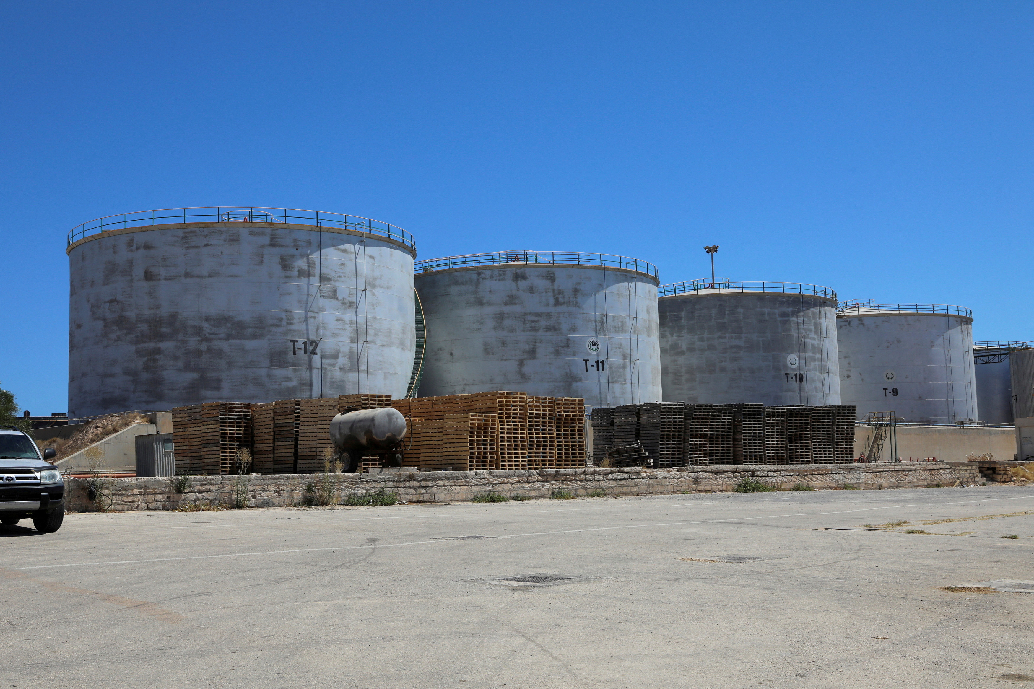 Crude oil storage tanks are seen at Azzawiya oil refinery, in Zawiyah west of Tripoli