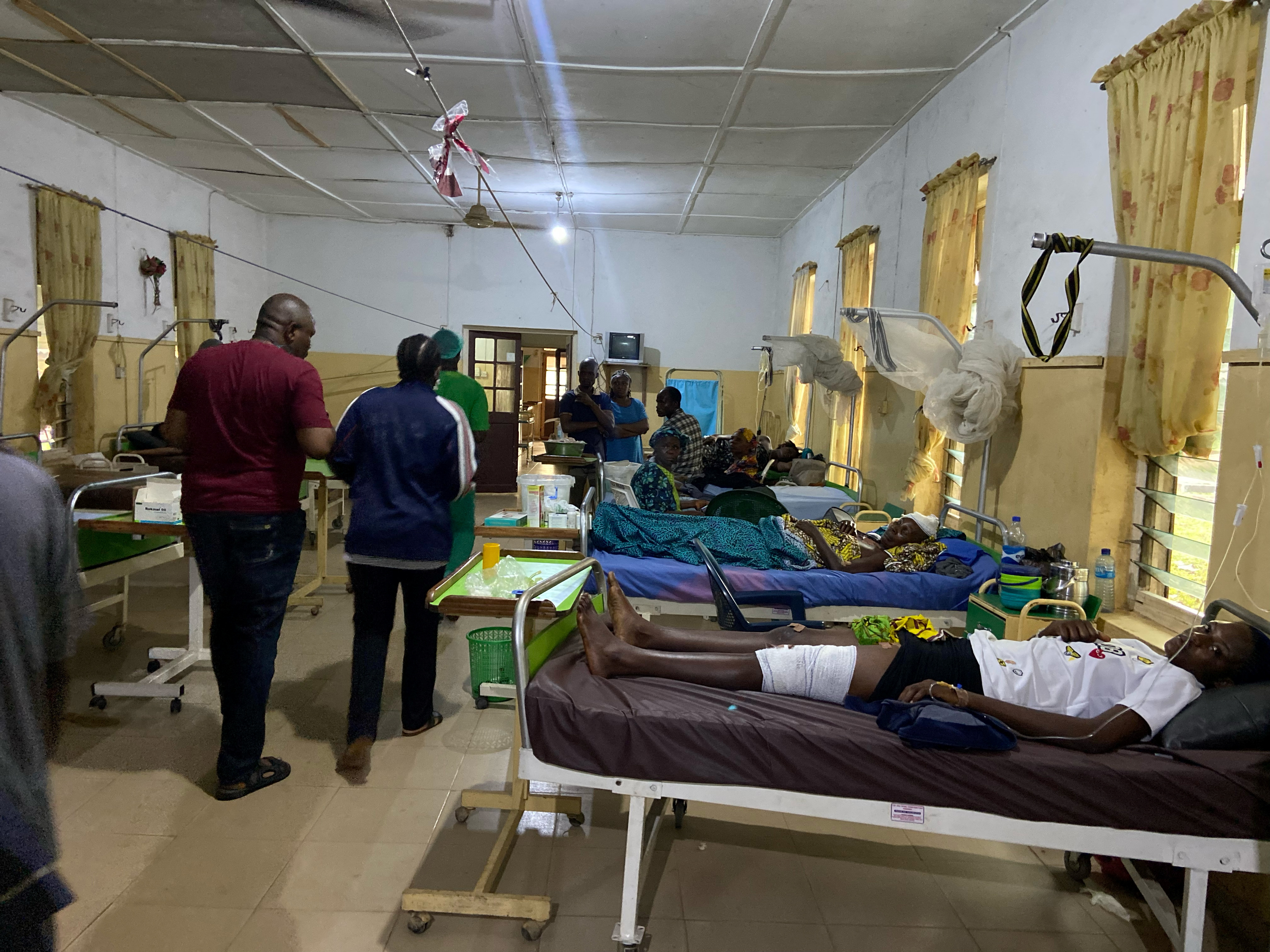 Victims of the bomb attack during a Catholic mass at St. Francis Catholic church receive treatment at St. Louis Catholic Hospital, in Owo