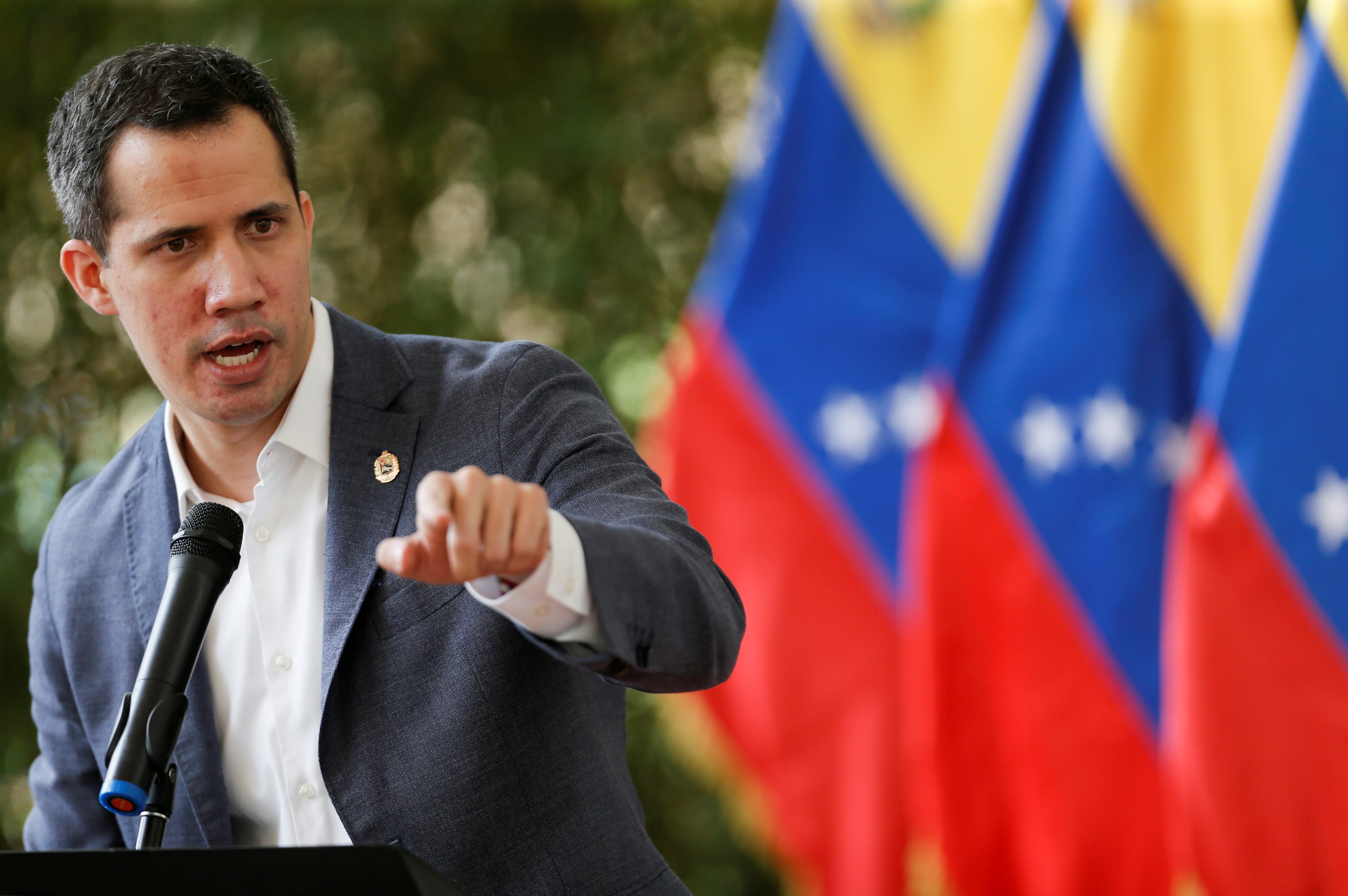 Venezuela's opposition leader Juan Guaido addresses the media, in Caracas