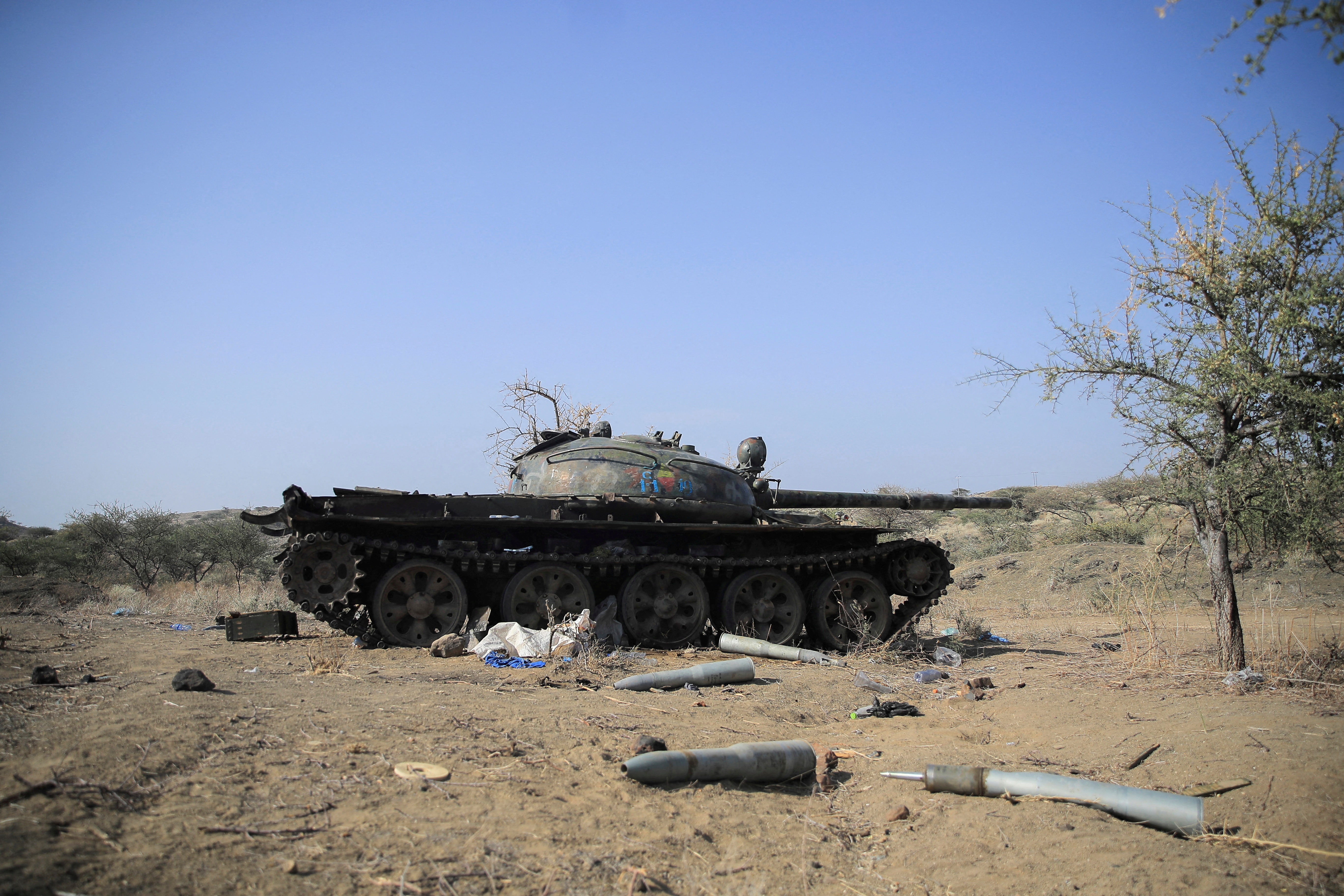 Ammunition is seen next to a tank destroyed in a fight between the Ethiopian National Defence Force (ENDF) and the Tigray People's Liberation Front (TPLF) forces in Kasagita town