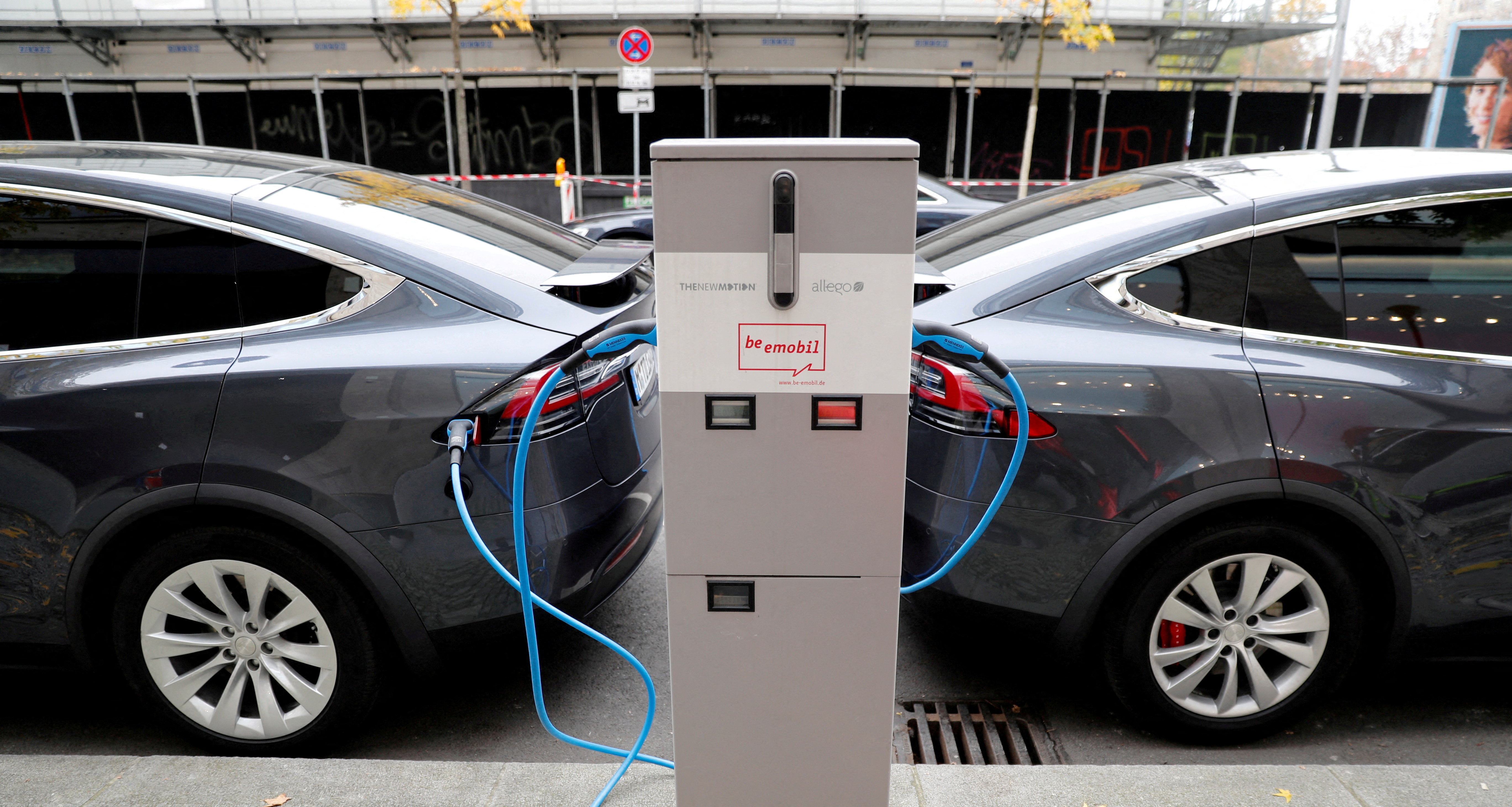 Tesla Model X electric cars recharge their batteries in Berlin