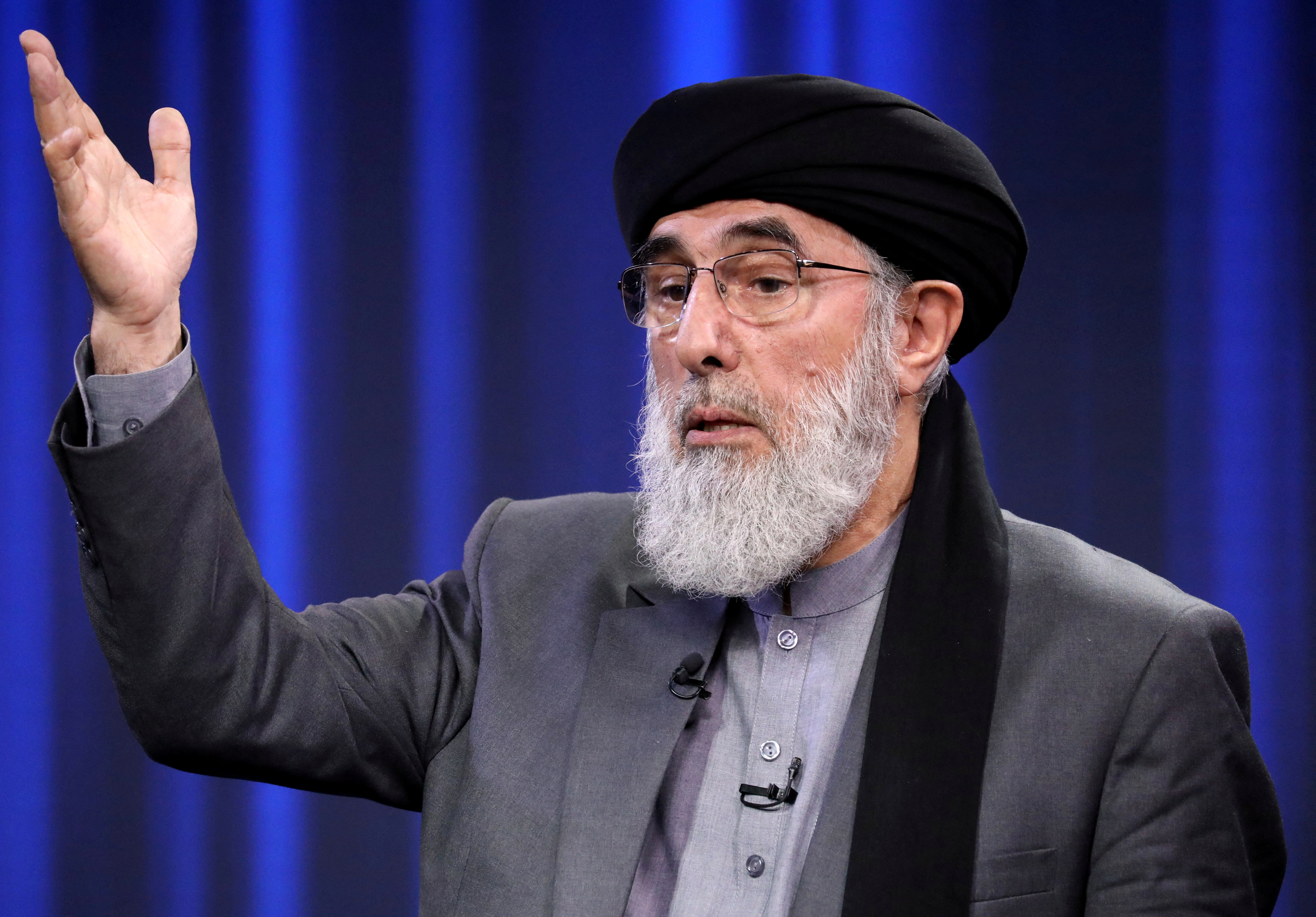 Former Afghan warlord and presidential candidate Gulbuddin Hekmatyar speaks during the presidential election debate at TOLO TV studio in Kabul