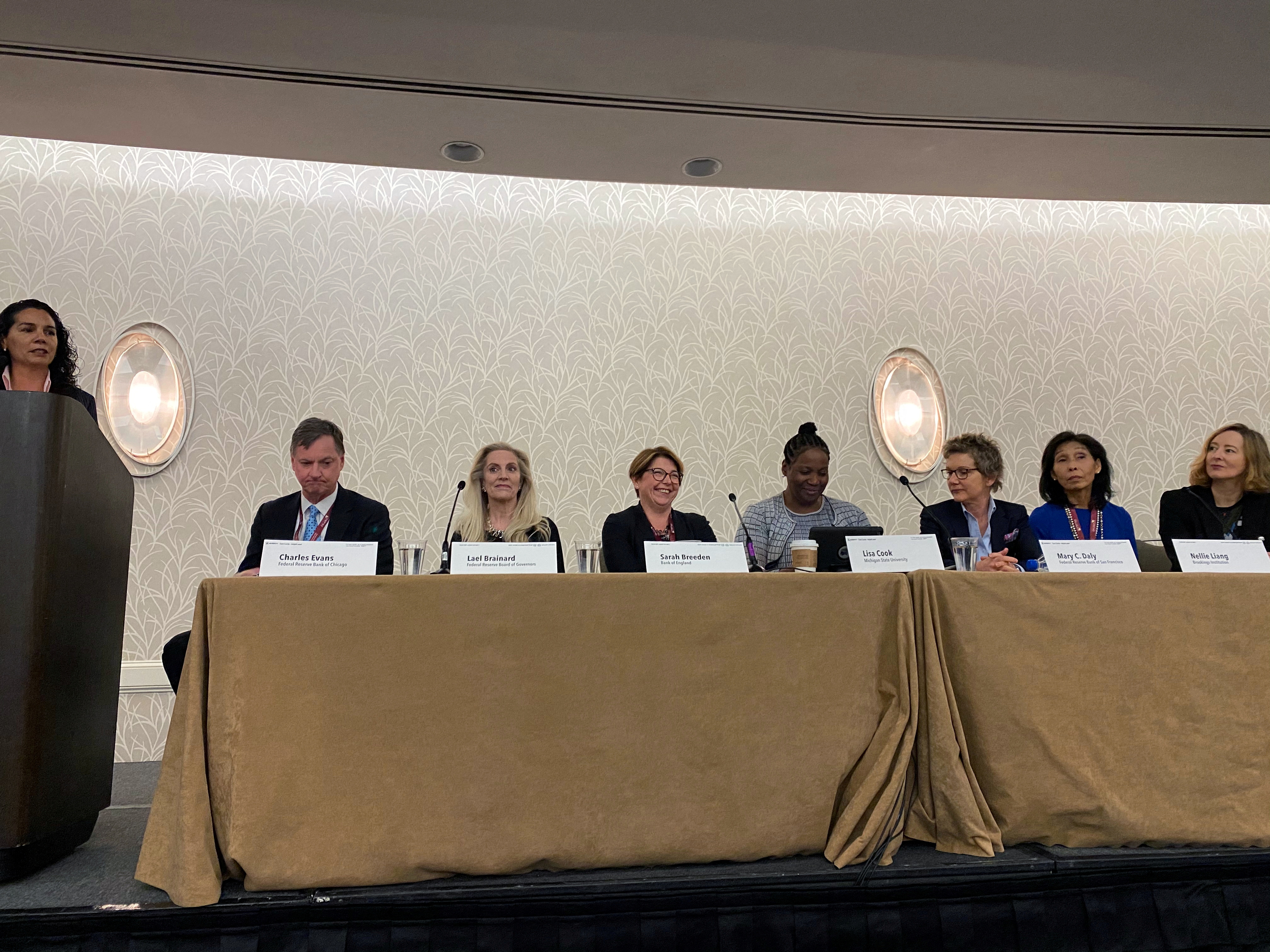 Chicago Federal Reserve Bank President Charles Evans prepares to moderate a panel on women in central banking at the American Economics Association's  annual meeting in San Diego