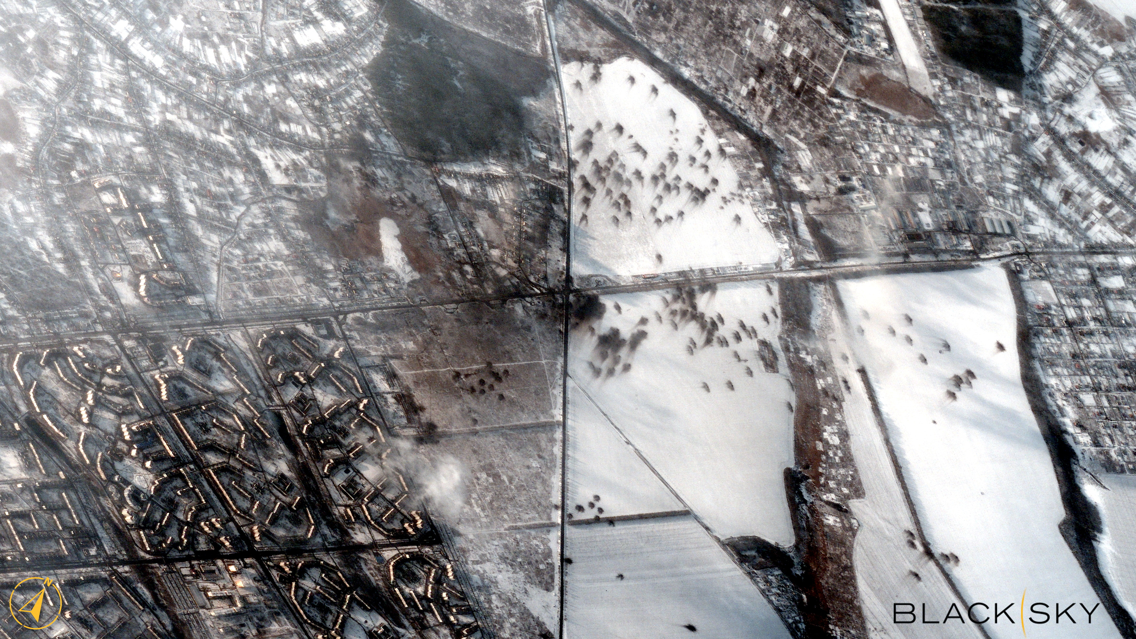 A satellite image shows the effects of shelling in open fields along Soborna Street in the northeast suburbs of Kharkiv