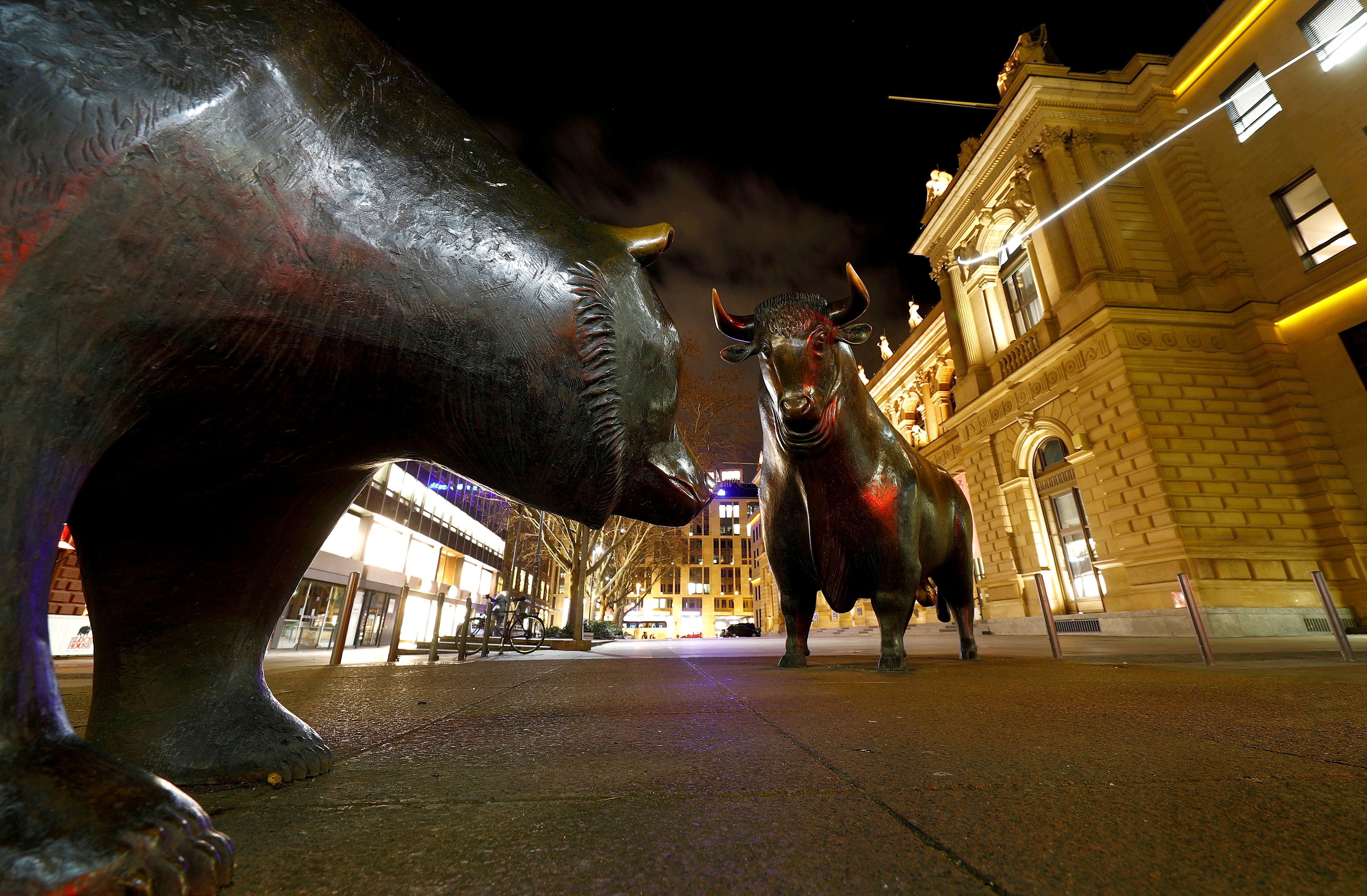 Bull and bear symbols are seen in front of the German stock exchange (Deutsche Boerse) in Frankfurt